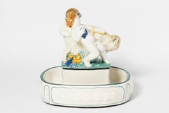 Enameled ceramic centerpiece. Germany, early 20th century.