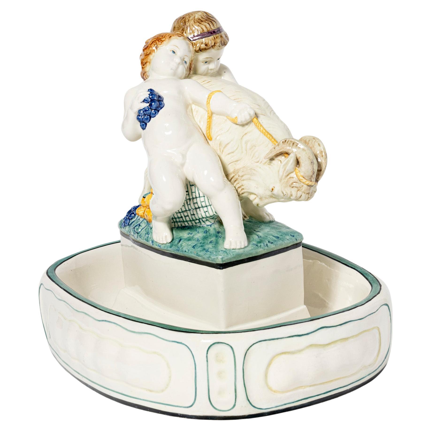 Enameled ceramic centerpiece. Germany, early 20th century.