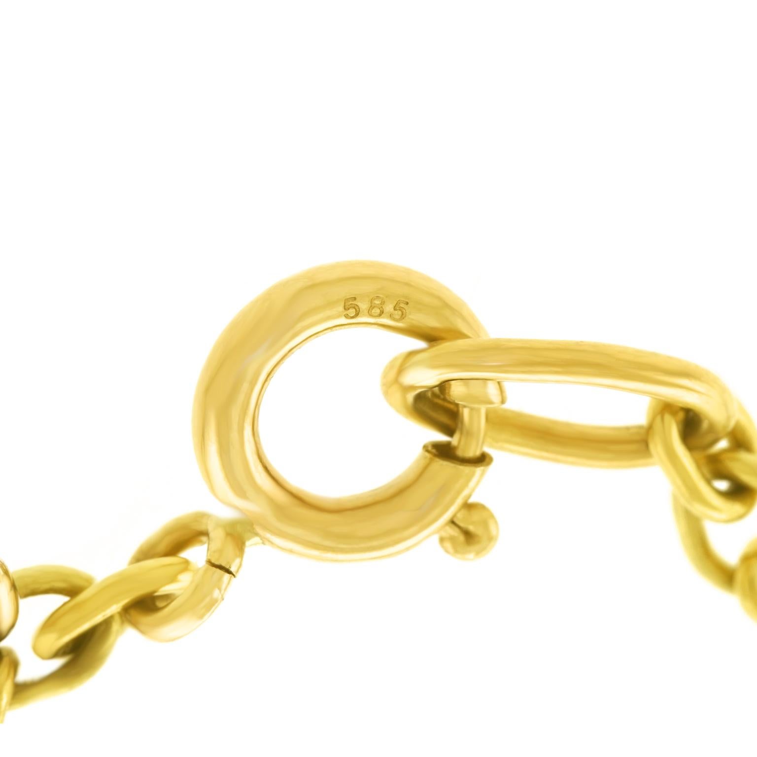 Enameled Clover Charm on a Gold Bracelet 1