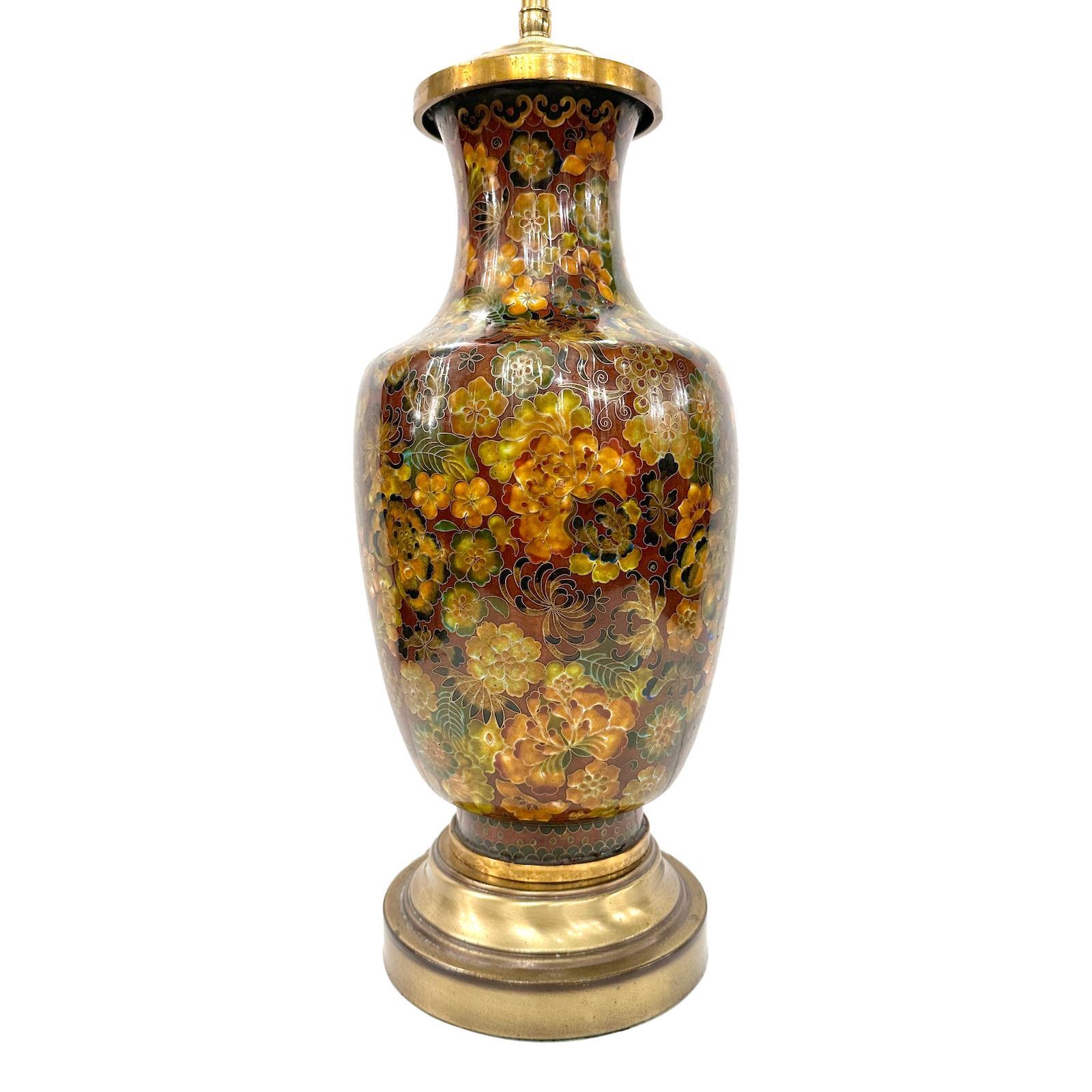 A circa 1940s Chinese enamelled table lamp with floral motif.

Measurements:
Height of body: 18
