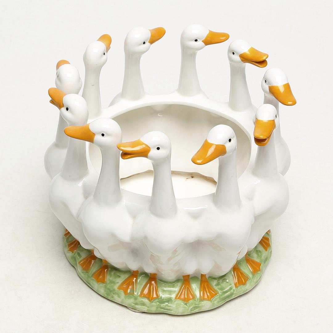 Round fruit bowl / goose dish, body with a gloss glaze. Bowl in the form of a row running geese made in the 1970s by Kayene AB Borås