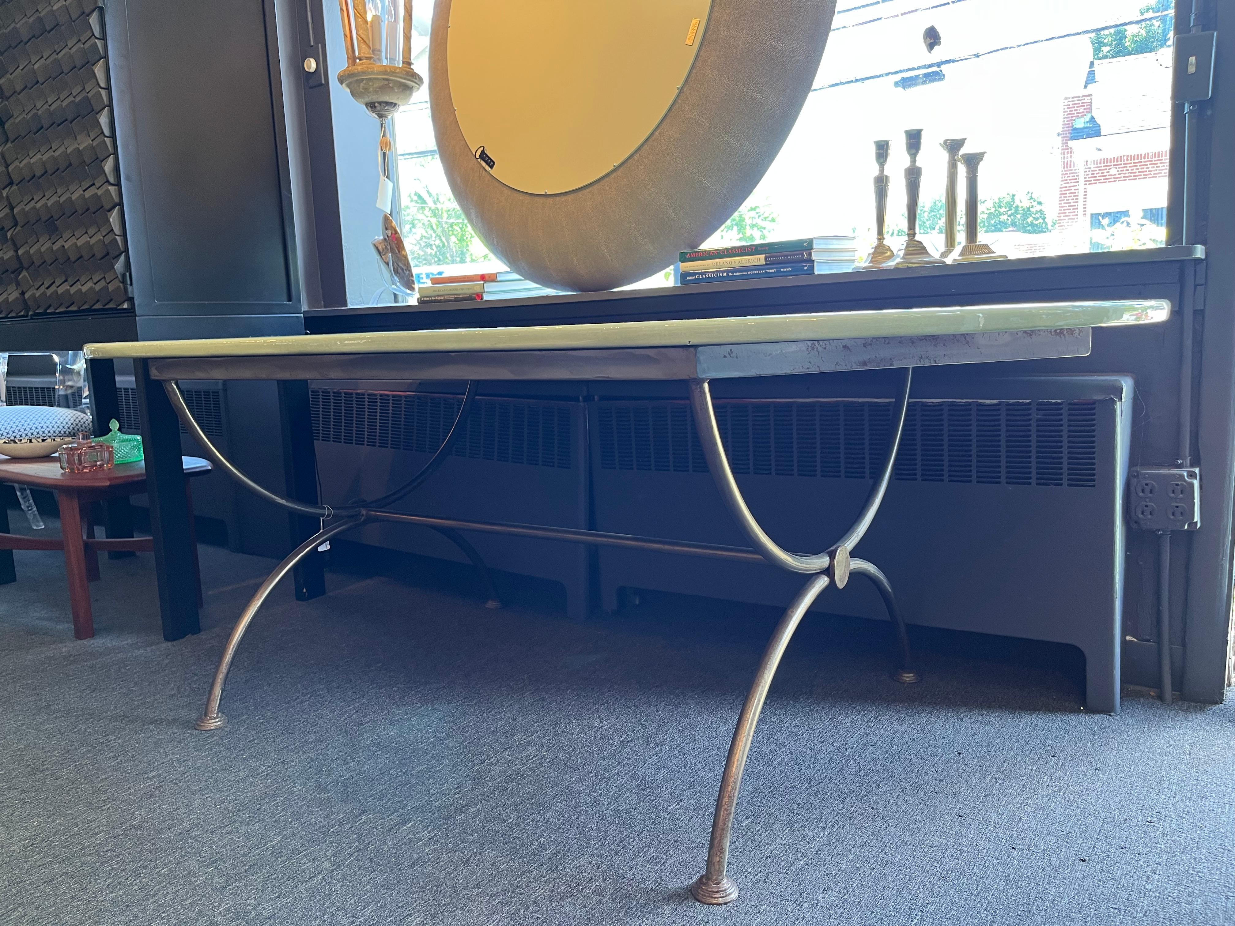 Enameled Lava Stone Racetrack Oval French lava stone top in beautiful green apple color dining table with a wrought iron base. Very heavy and solid and has an exceptionally hard, resistant surface that can be left outdoors year round. The table top