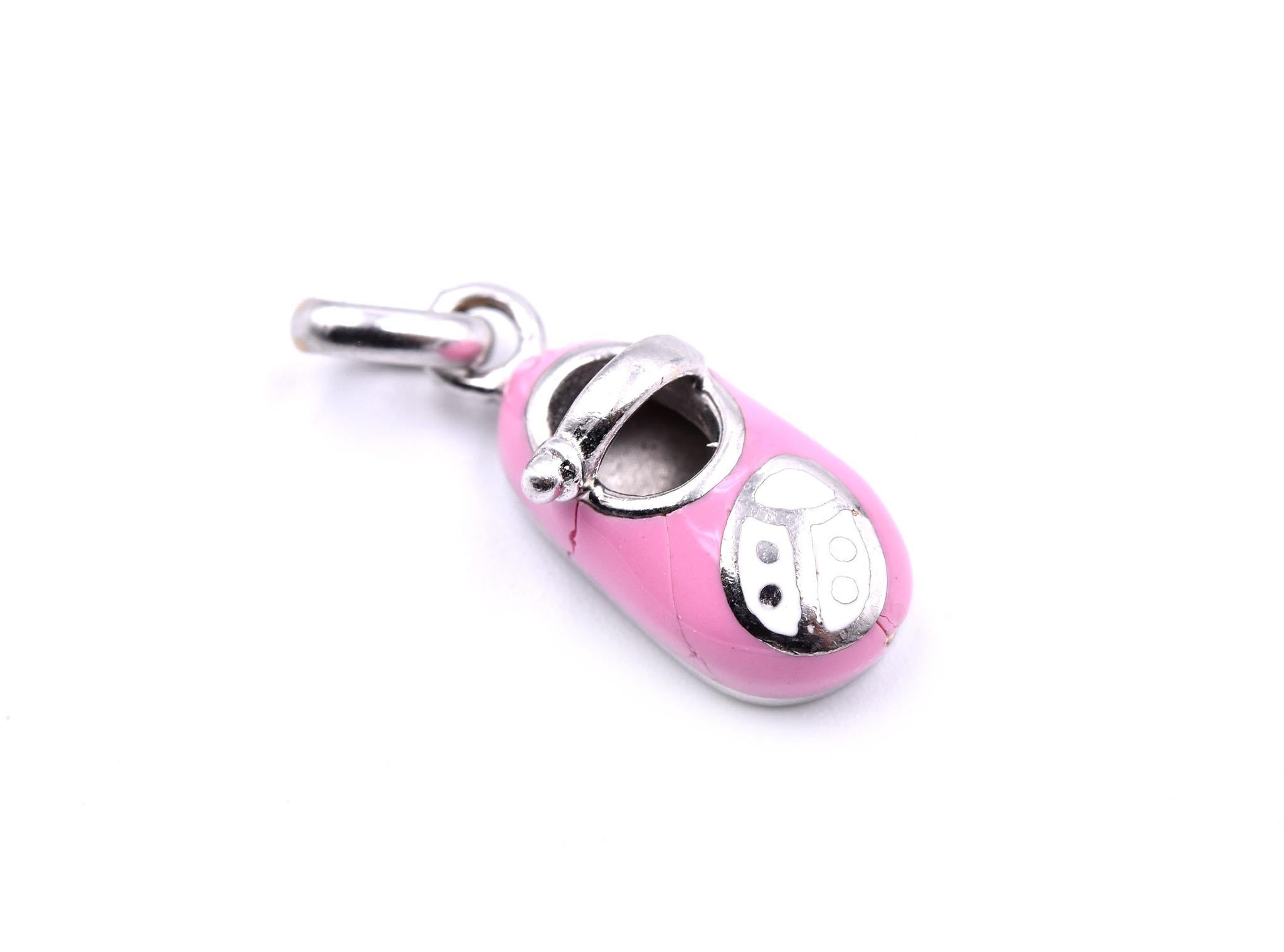 Designer: custom design
Material: 14k yellow gold & pink enamel
Dimensions: charm is 21mm long and 8.8mm wide
Weight: 2.9 grams
