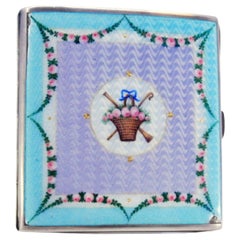 Enameled silver cigarette case with flowers and wavy designs, hinged lid