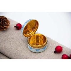 Enameled silver pill box, gold interior and hinged lid