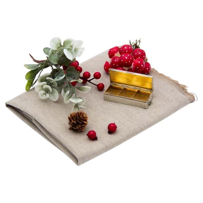 Enameled silver stamp box, gold interior and hinged lid with lined bottom