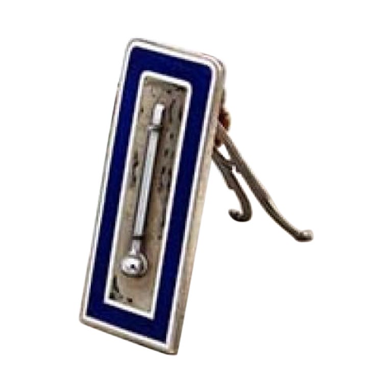 Enameled silver thermometer with engraved cut-out stand