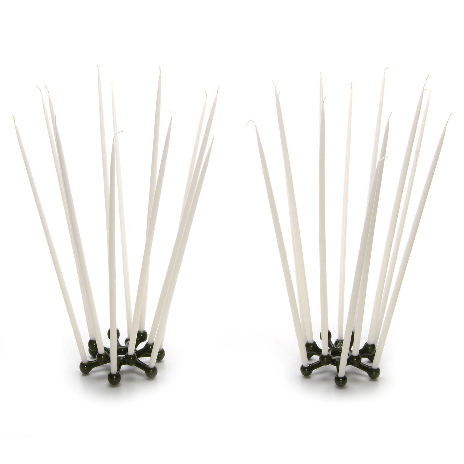 Enameled Spider (pair) rare tiny taper holders by Jens Quistgaard for Dansk Designs in 1963. Ultra-rare Mid-Century Modern cast iron candle holders for tiny tapers, each fit 12 candles!

The Spider is a candleholder for up to 12 tiny tapers