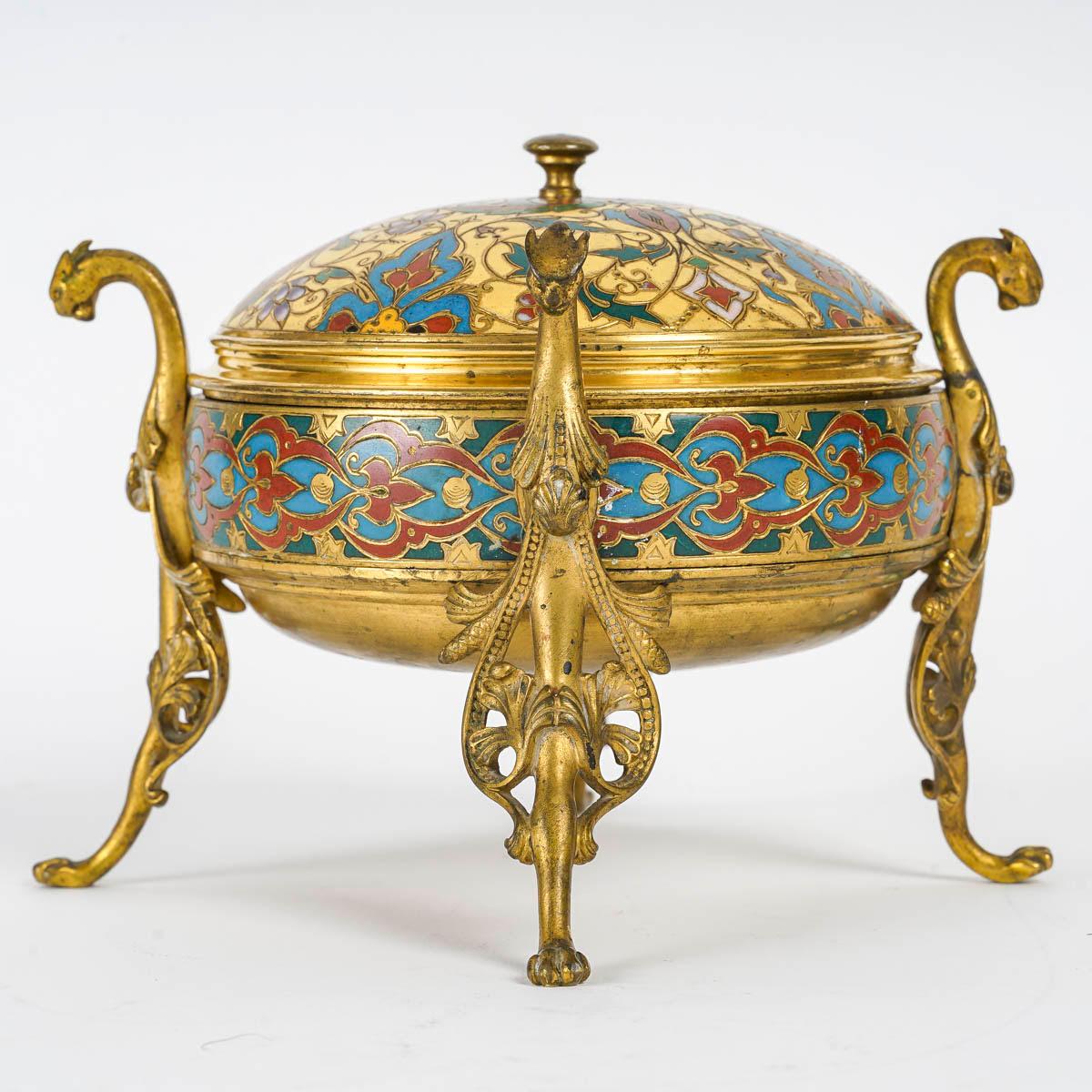 Enamelled bronze box, signed F. Barbedienne, 19th century, Napoleon III period.

Yellow, blue and red enamelled bronze box, signed F. Barbedienne, 19th century, Napoleon III period.
h: 15cm, d: 21,5cm
