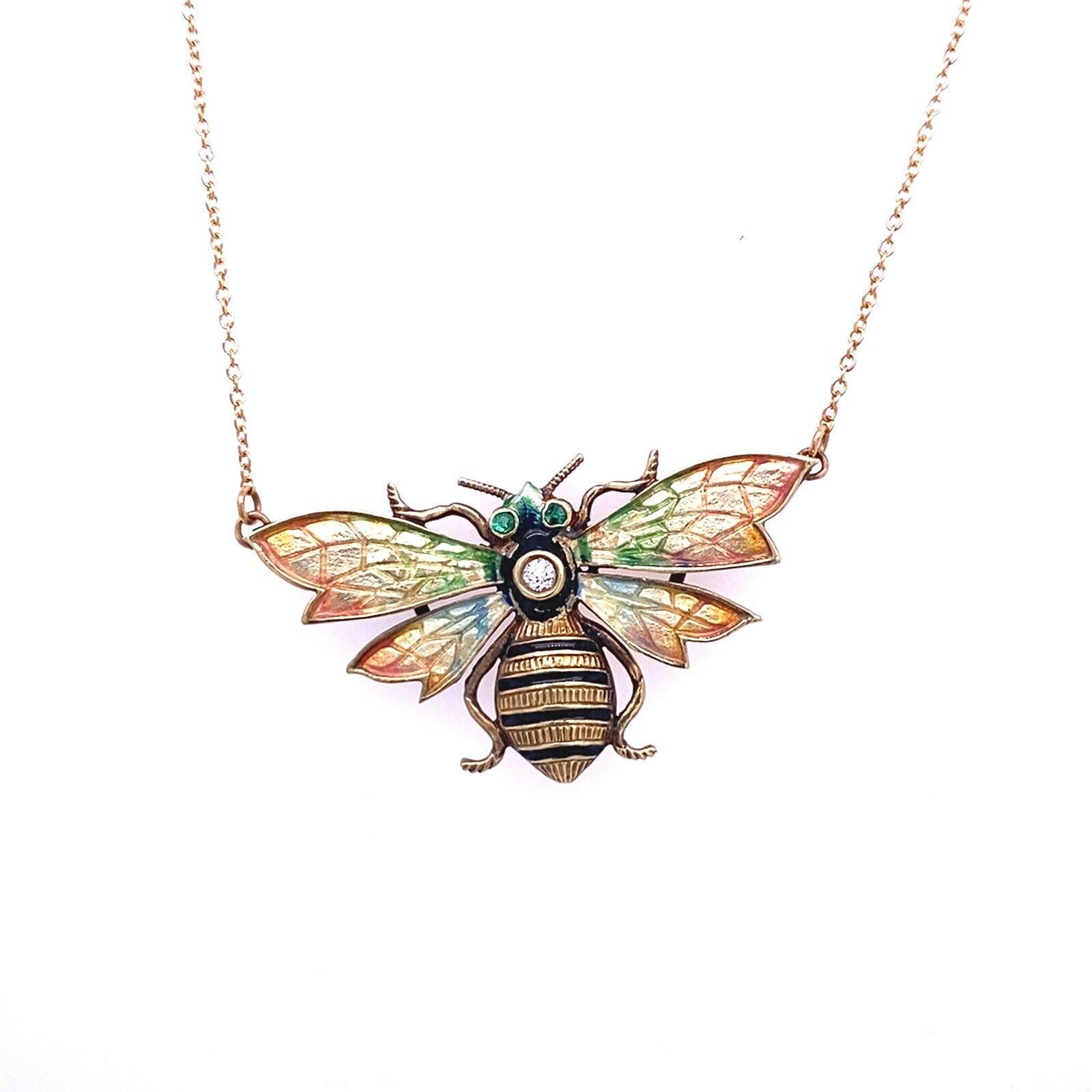 Enamelled Diamond & Emerald Bumble Bee Pendant on 18ct Yellow Gold Chain

This beautiful enameled bumble bee pendant is mounted on a sparkling diamond and emeralds setting. It is suspended from a delicate 18ct yellow gold chain. The butterfly isn't