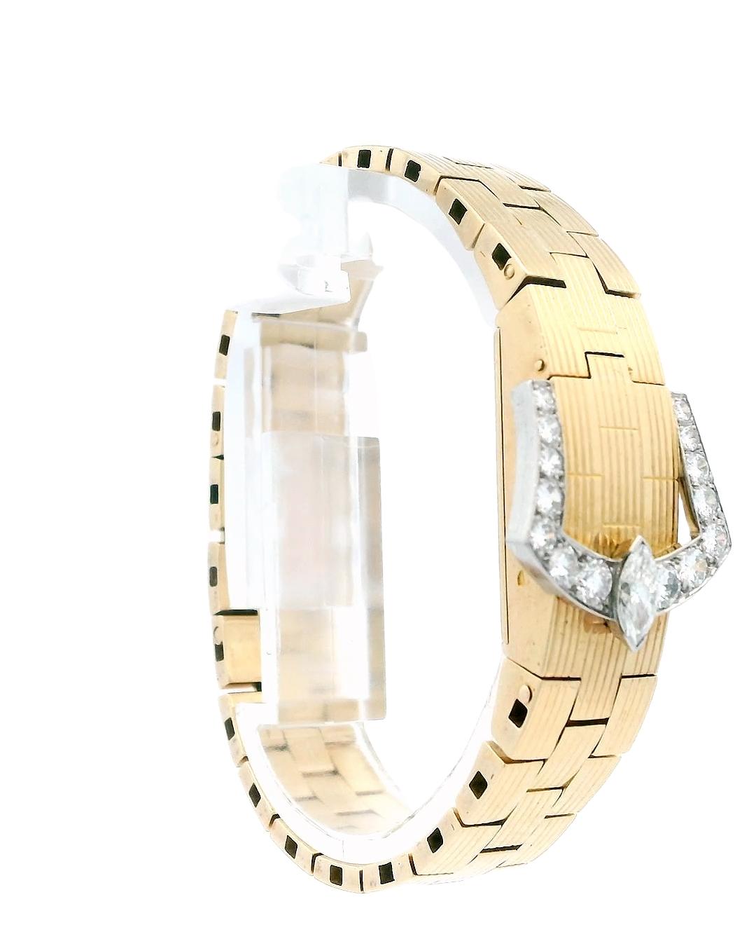 Enhance your collection with this elegant watch crafted in 18k yellow gold, featuring a rectangular shape and manual movement.

The champagne dial is adorned with Arabic numerals, offering a classic touch. The snap case back ensures a secure