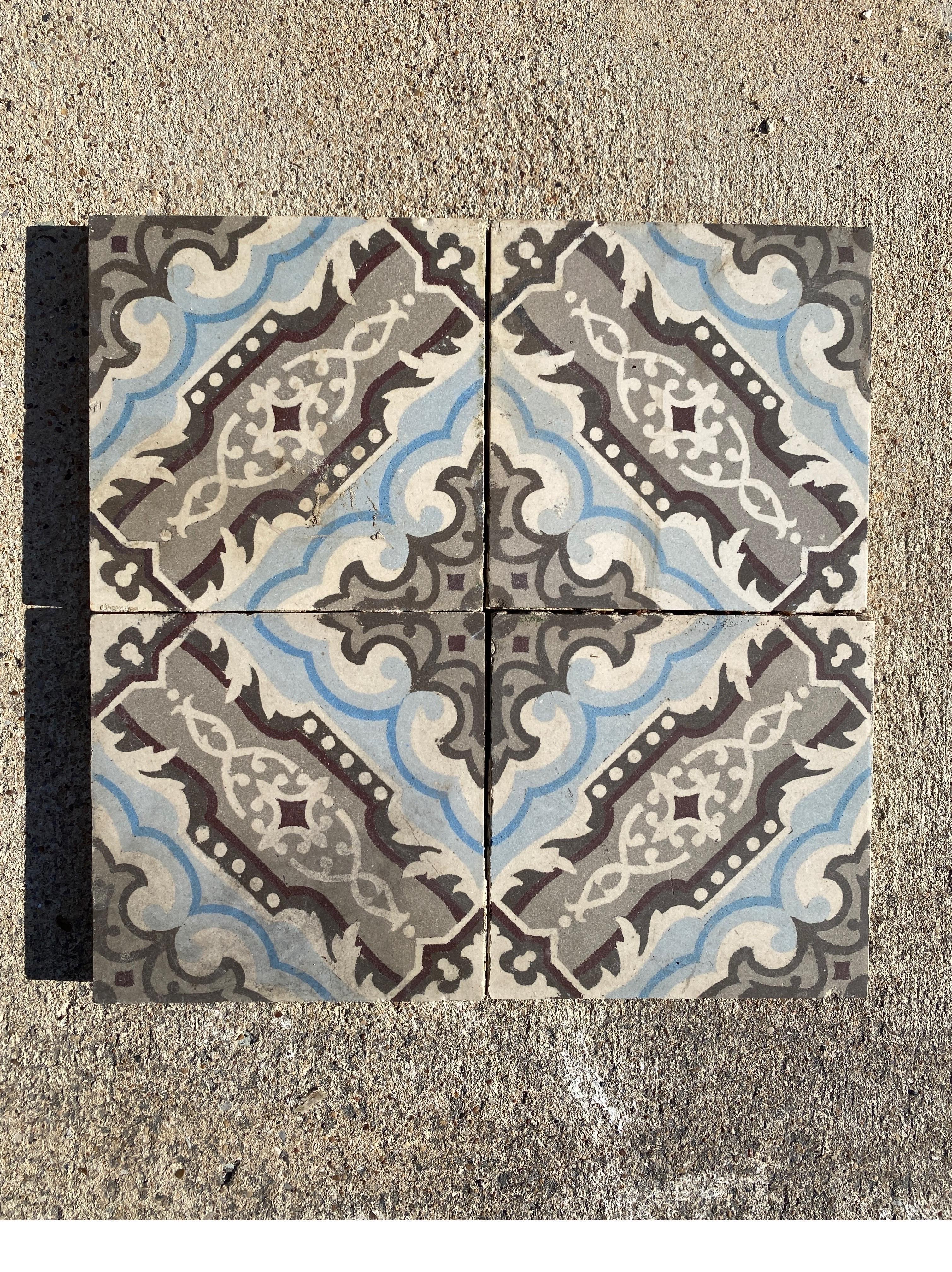 Beautiful blue and grey encaustic tiles.

Long borders are 2.75
