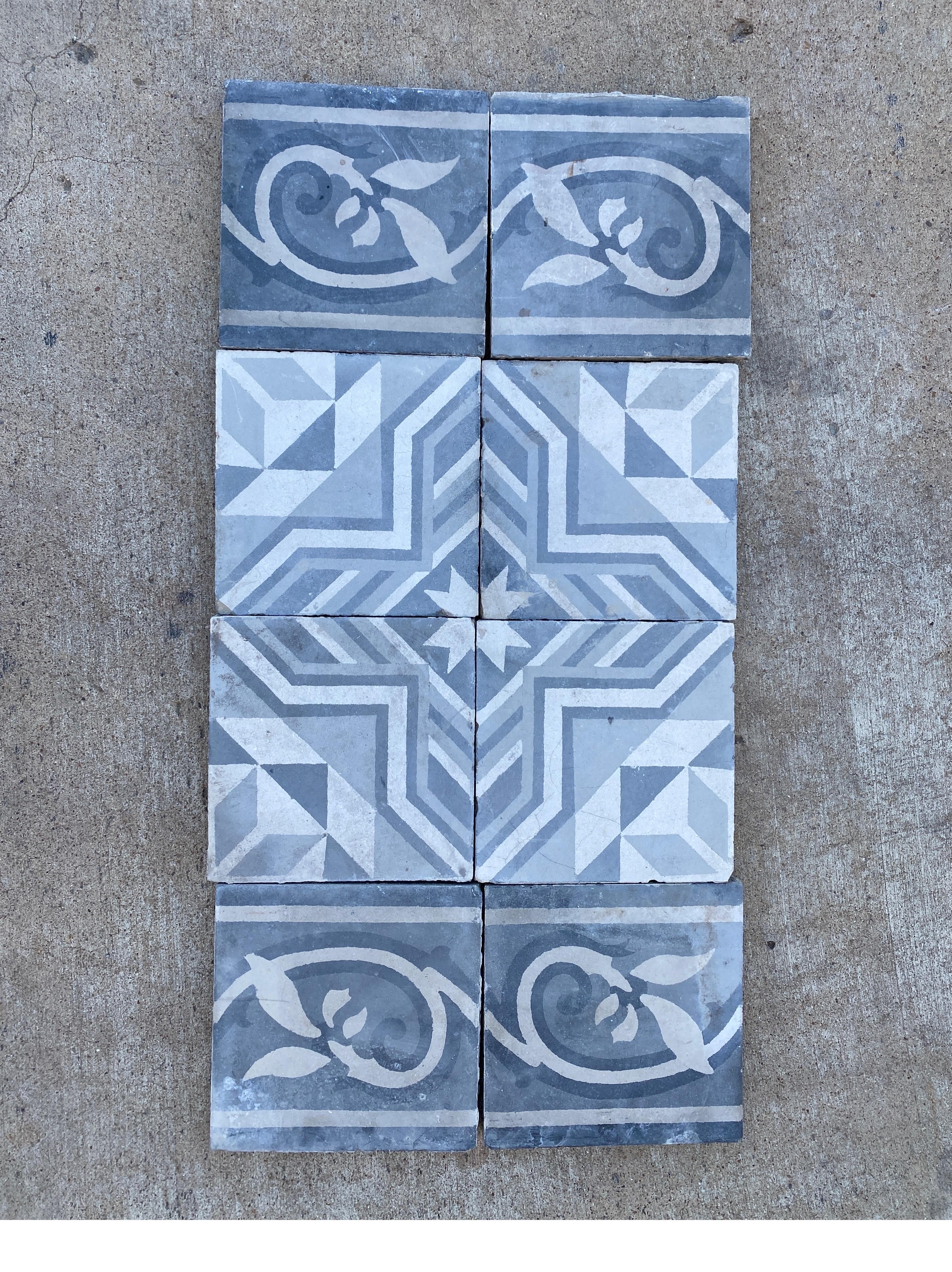Beautiful grey encaustic tiles with floral borders.

We have 290 sq ft of the field  + 151 linear ft of the borders.

We only sell the entire lot.