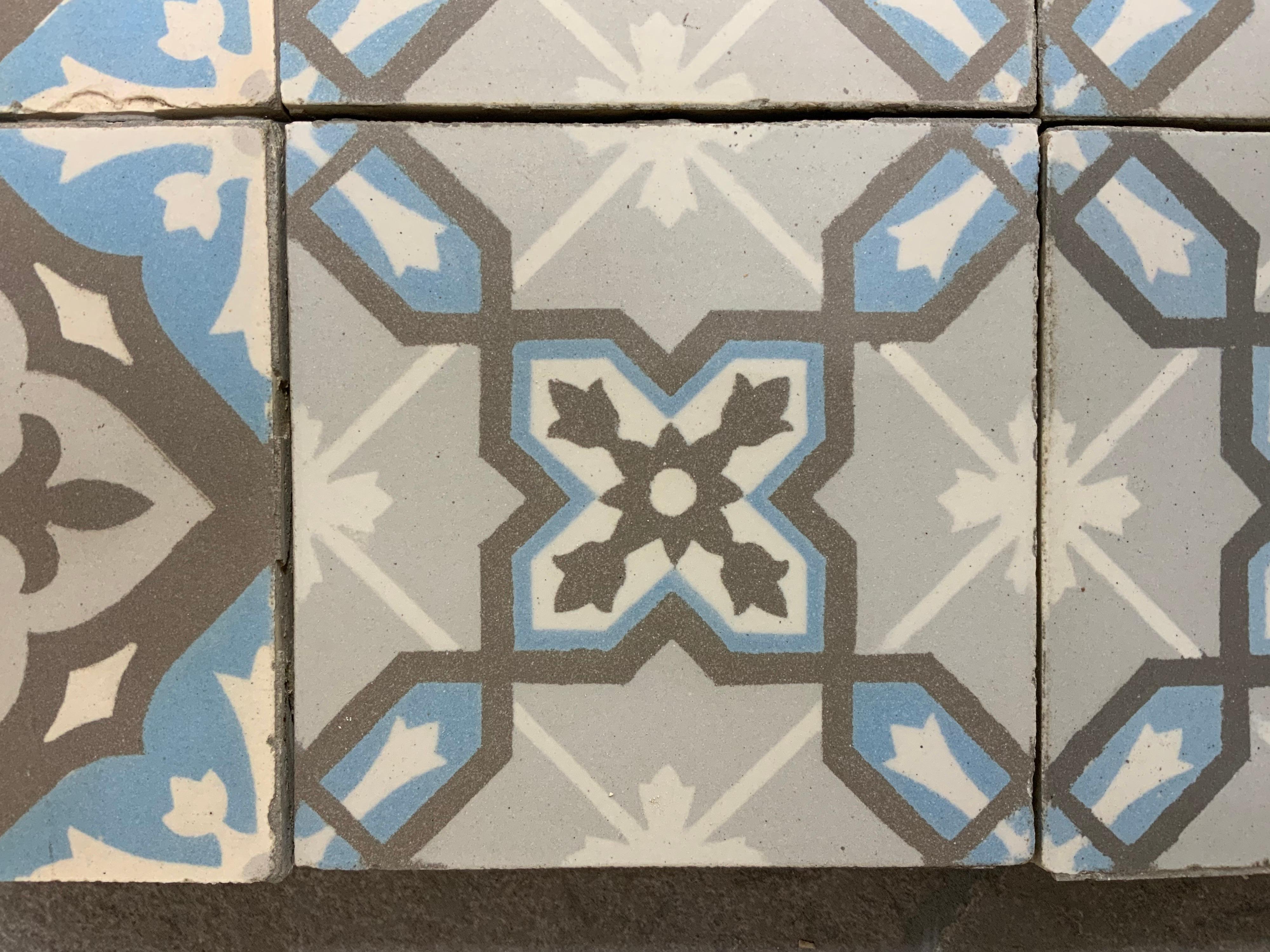 Beautiful blue and gray encaustic tiles with borders.

We have 150 sq ft of the field and 96 linear ft of the borders.

We only sell the entire lot.

