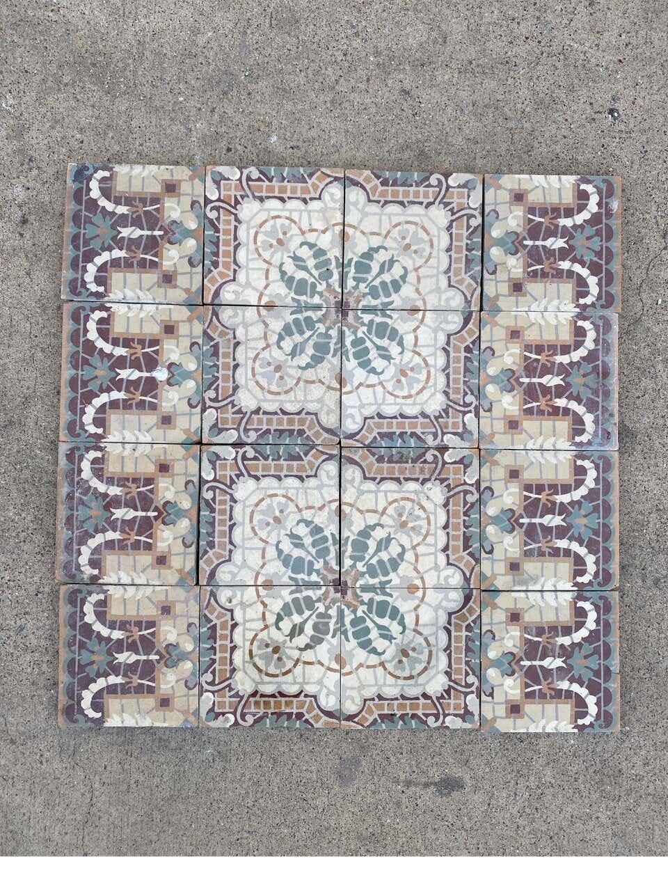 Beautiful tan, blue, and white encaustic tiles with floral borders.

We have 105 sq ft of the field (520 pieces) + 77 linear ft of the borders (170 pieces).

We only sell the entire lot.
  