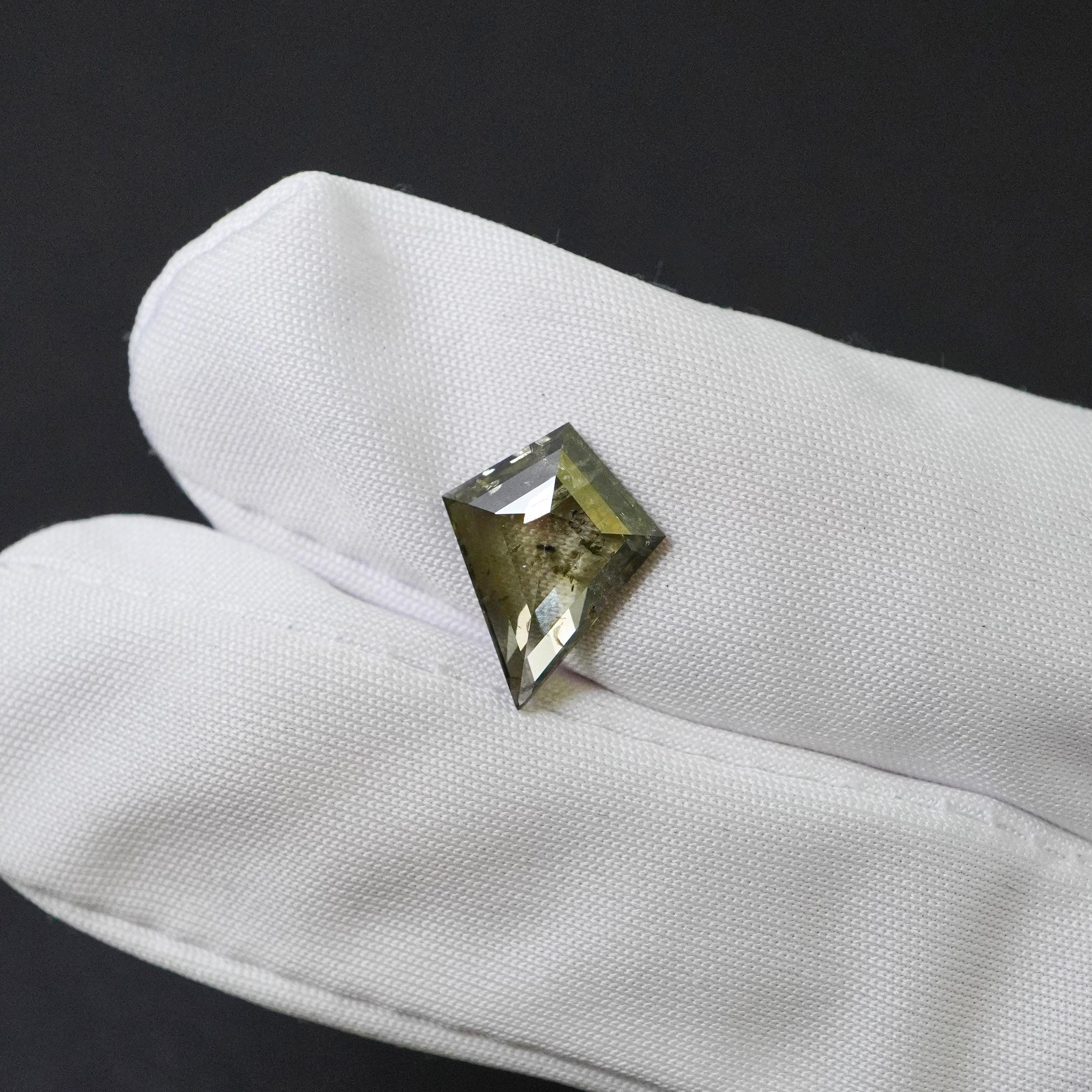 The allure of our 1.96 carat GIA Certified Chameleon Diamond, a true marvel of nature. Chameleon diamonds are among the rarest and most mysterious gems, celebrated for their unique ability to change color under varying lighting conditions. This