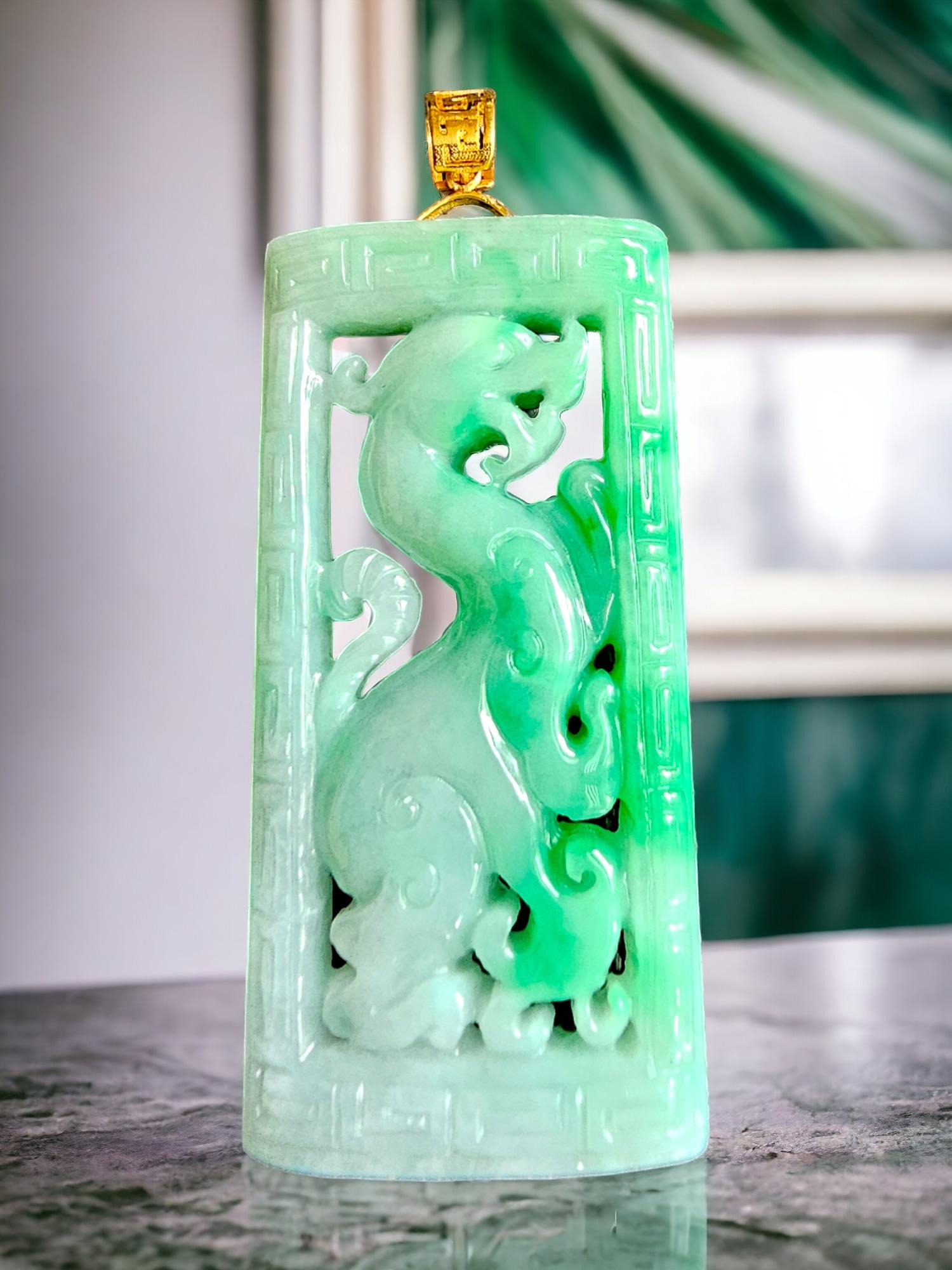 Our Enchanted Dragon is a limited to one-of-one design, intricately hand carved out from the best handpicked Imperial Burmese A-Jadeite. This Jadeite completely untreated and natural. We allow the optics of jade depict the story, and we finish it