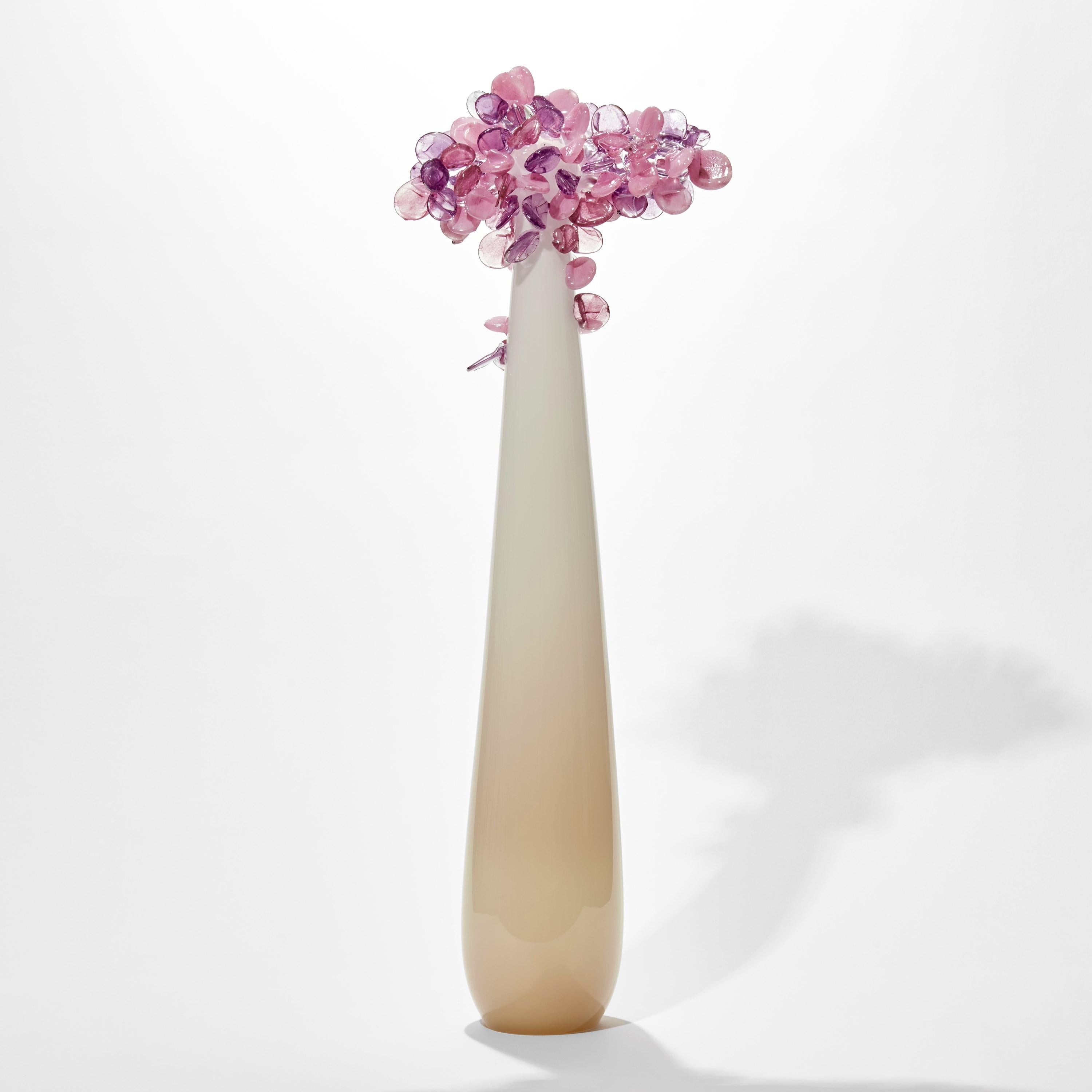 'Enchanted Dusk in Rubies' is a unique glass tree sculpture by the British artist, Louis Thompson.

With both his Enchanted Dawn and Dusk collections, Thompson brings a joyous and playful element to his glass. Gracious sweeping trunks are topped