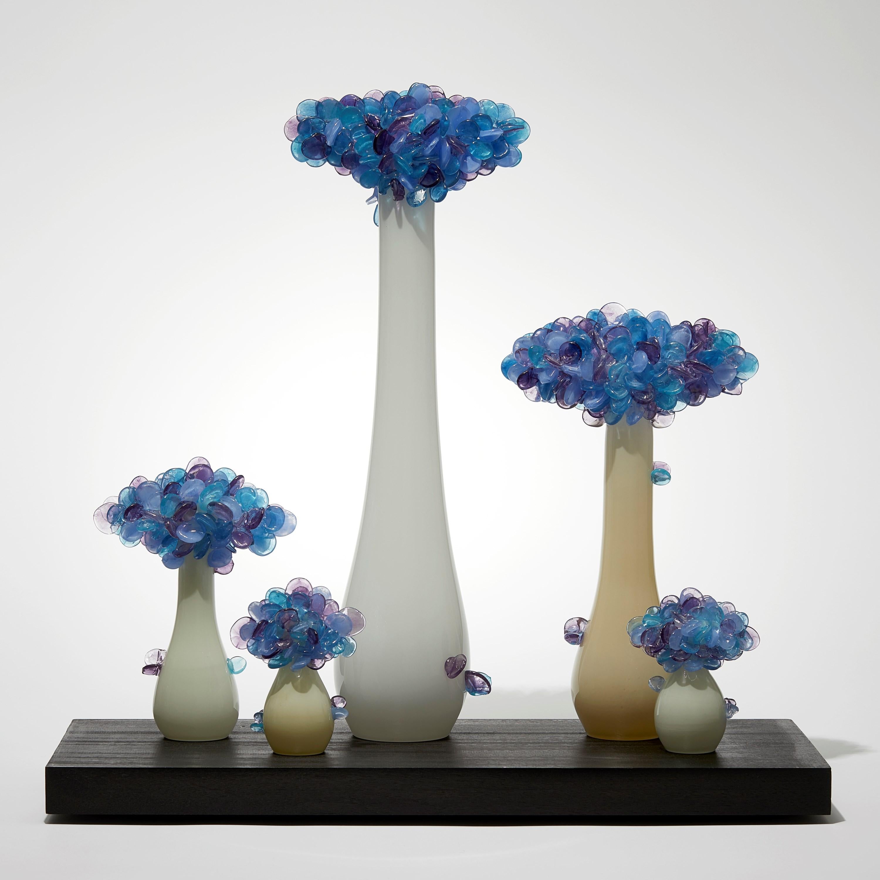 'Enchanted Mori Dawn' is a unique sculpted glass installation by the British artist, Louis Thompson.

Thompson's Enchanted Mori are inspired by the practice of bonsai, echoing its artistic intention to create a higher level of aesthetic refinement.
