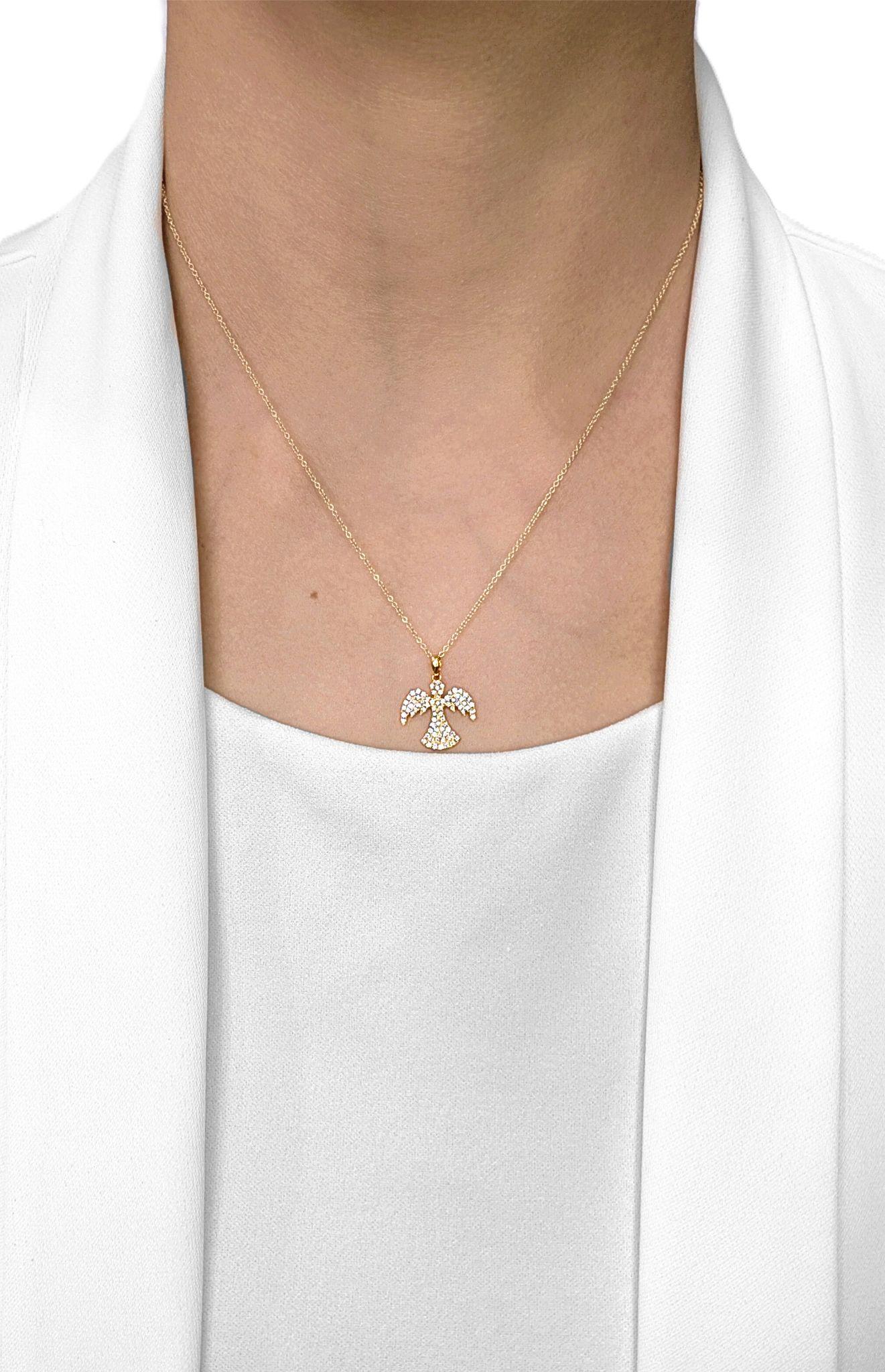 Infuse everyday looks with a celestial glow through this angel pendant, meticulously crafted in warm 18K yellow gold and paved with 79 round brilliant diamonds totaling 0.39 ct. The G-H color and VS-SI clarity of each stone ensure a crisp, white