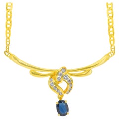 Encantador Collar de Zafiro y Diamantes de 0,58 ct con Colgante en Oro Amarillo de 18k