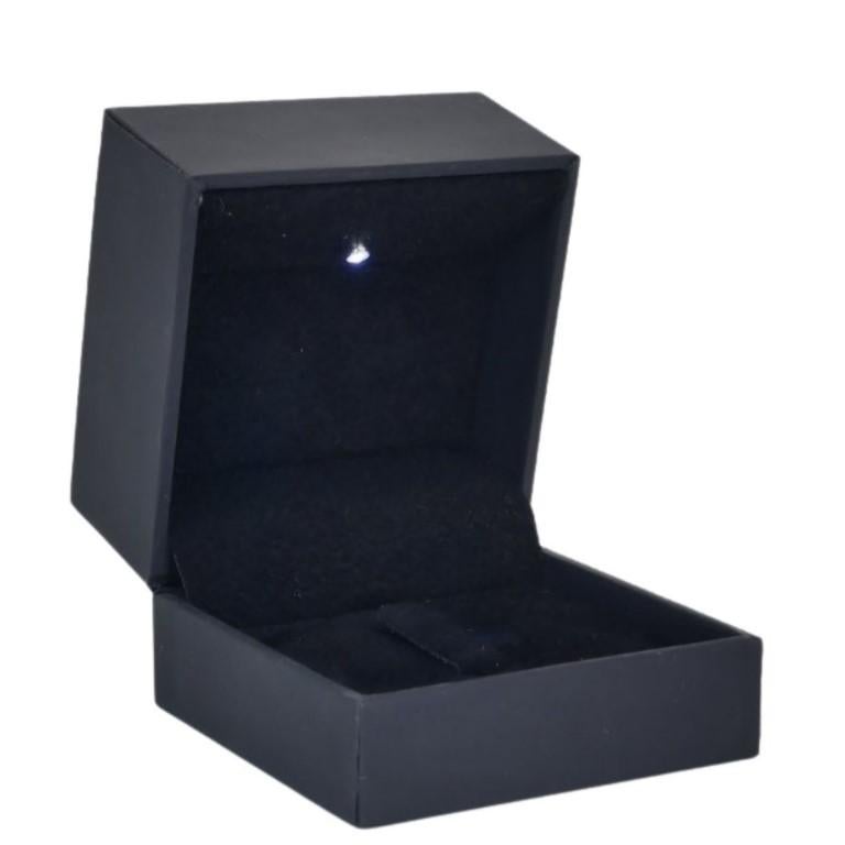 Enchanting 0.93ct Tanzanite and Diamonds Halo Ring in 18k White Gold - IGI  For Sale 5