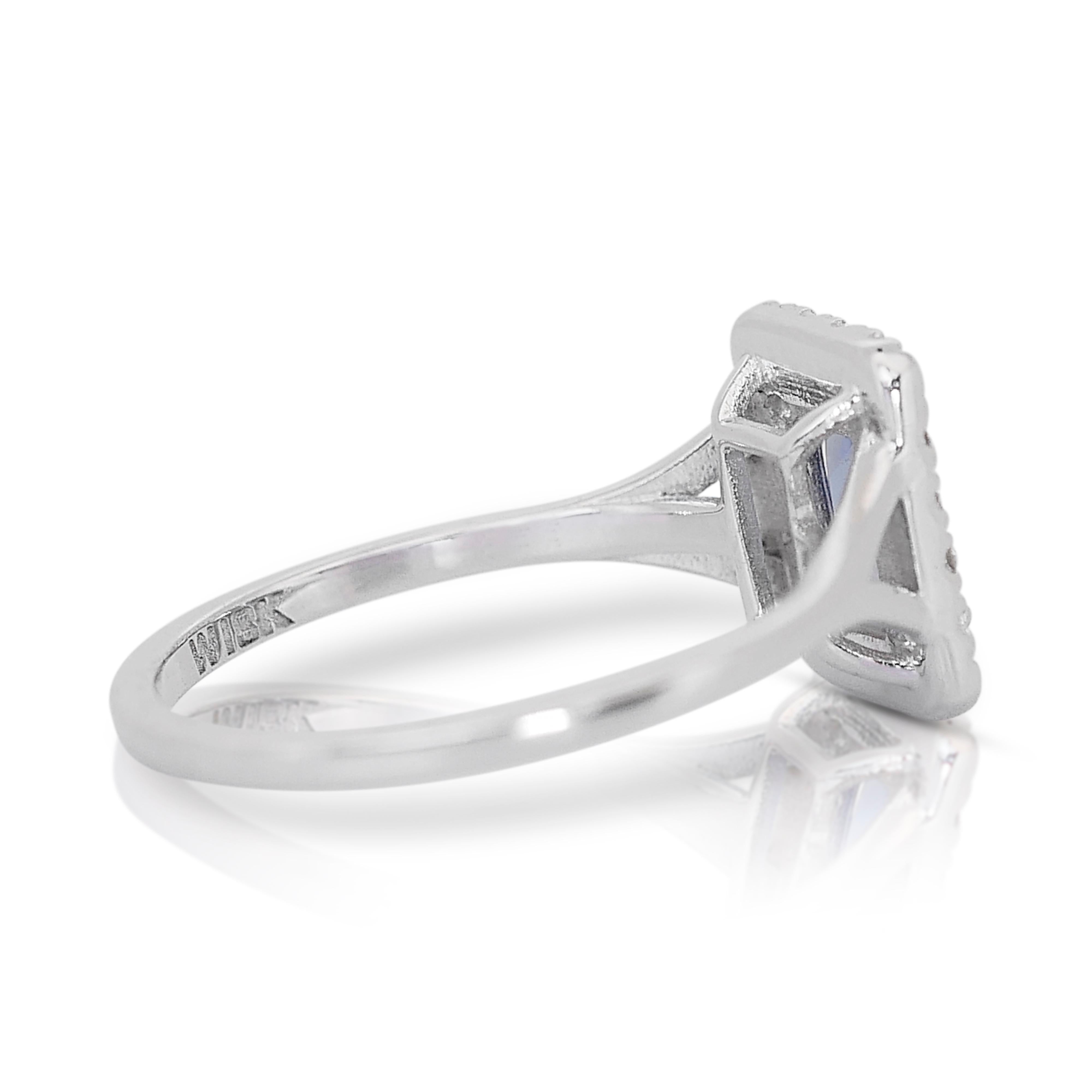 Enchanting 0.93ct Tanzanite and Diamonds Halo Ring in 18k White Gold - IGI  In New Condition For Sale In רמת גן, IL