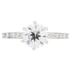 Verlobungsring aus Platin mit bezauberndem 1,24 Karat Diamant im europäischen Schliff und Schnörkelarbeit