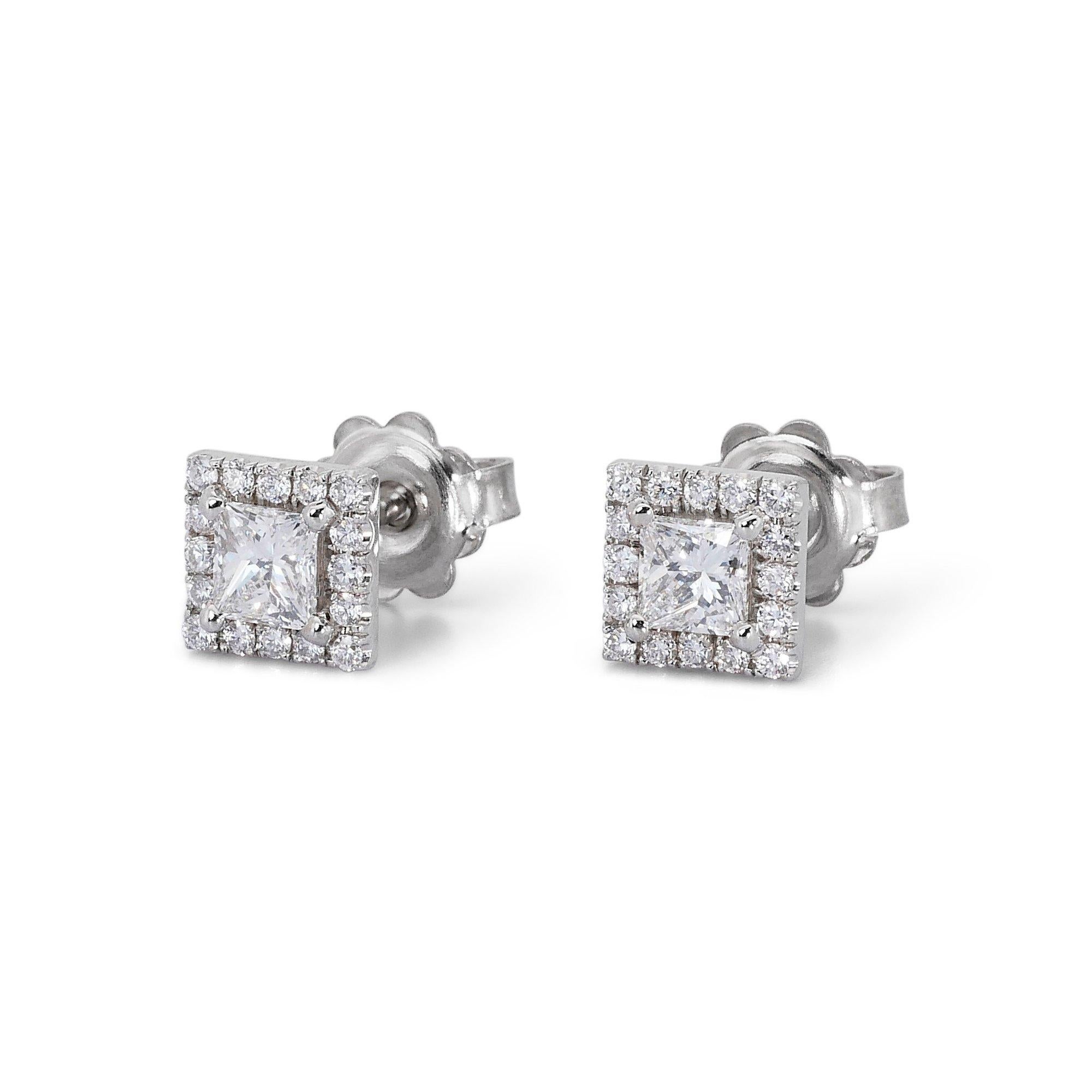 Enchanting 1.33ct Diamond Halo Stud Earrings in 18k White Gold - GIA Certified 

These captivating earrings showcase a stunning duo of 1.01-carat, square-cut diamonds. The brilliance of the center stones is further emphasized by a halo of 32