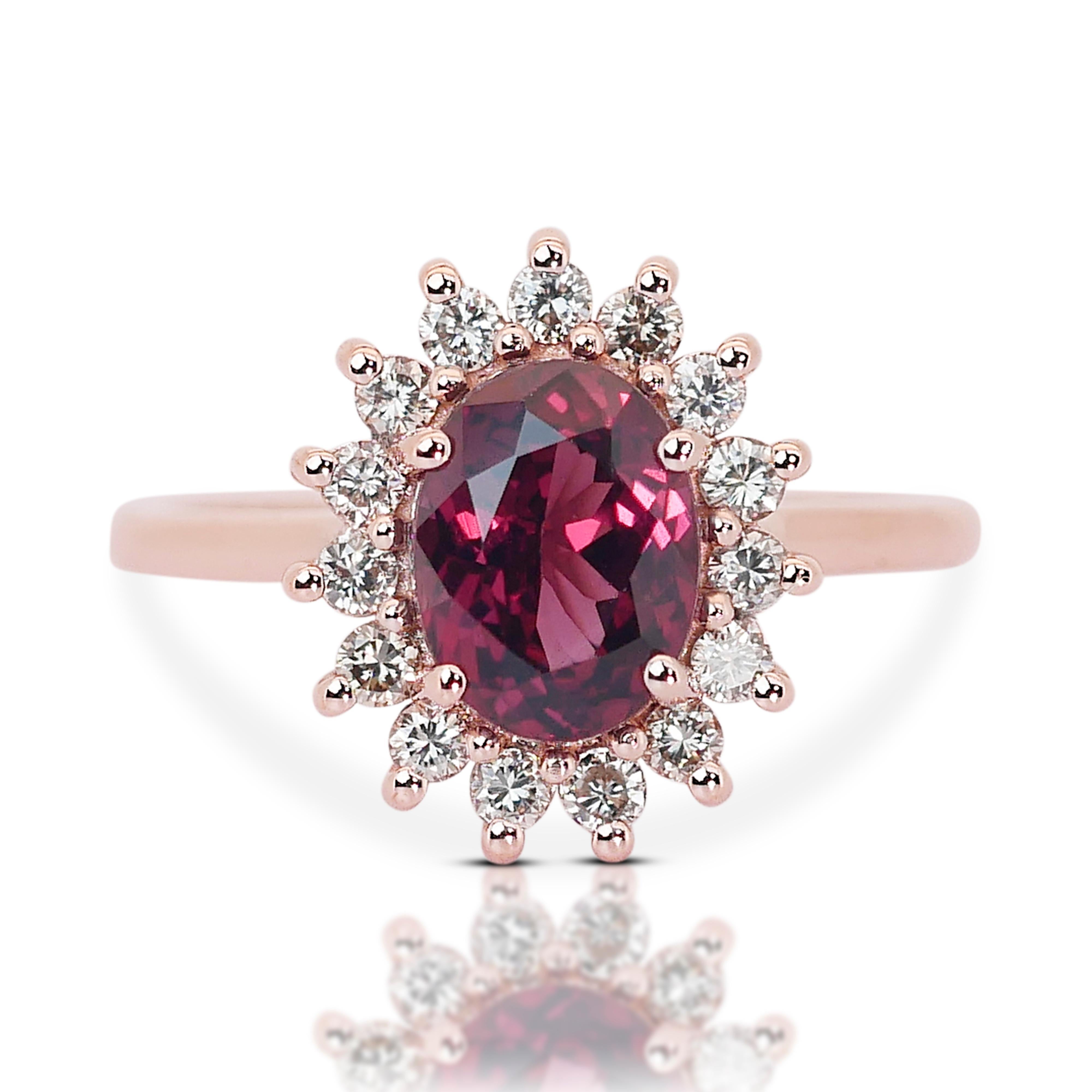 Enchanting 14K Pink Gold Garnet and Natural Diamond Ring w/2.32ct 

At the heart of this enchanting ring gleams a magnificent Garnet main stone, boasting an impressive weight of 2.01 carats. The mixed cut of the stone enhances its brilliance and
