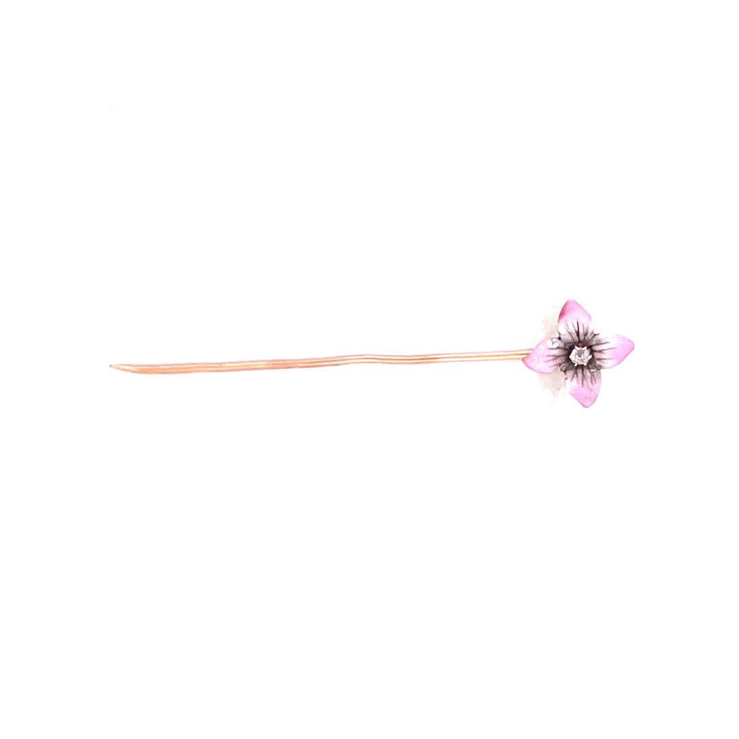 Capture the essence of enchantment with this 14k yellow gold pink enamel flower pin. The pin features a delicate flower design with four petals adorned in a lovely light pink enamel, at the center of the flower, a small diamond. Weighing just 1.3