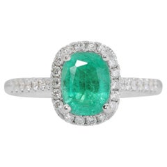 Enchanting 18k White Gold Cushion Emerald and Diamond Halo Ring w/2.10 ct - IGI 