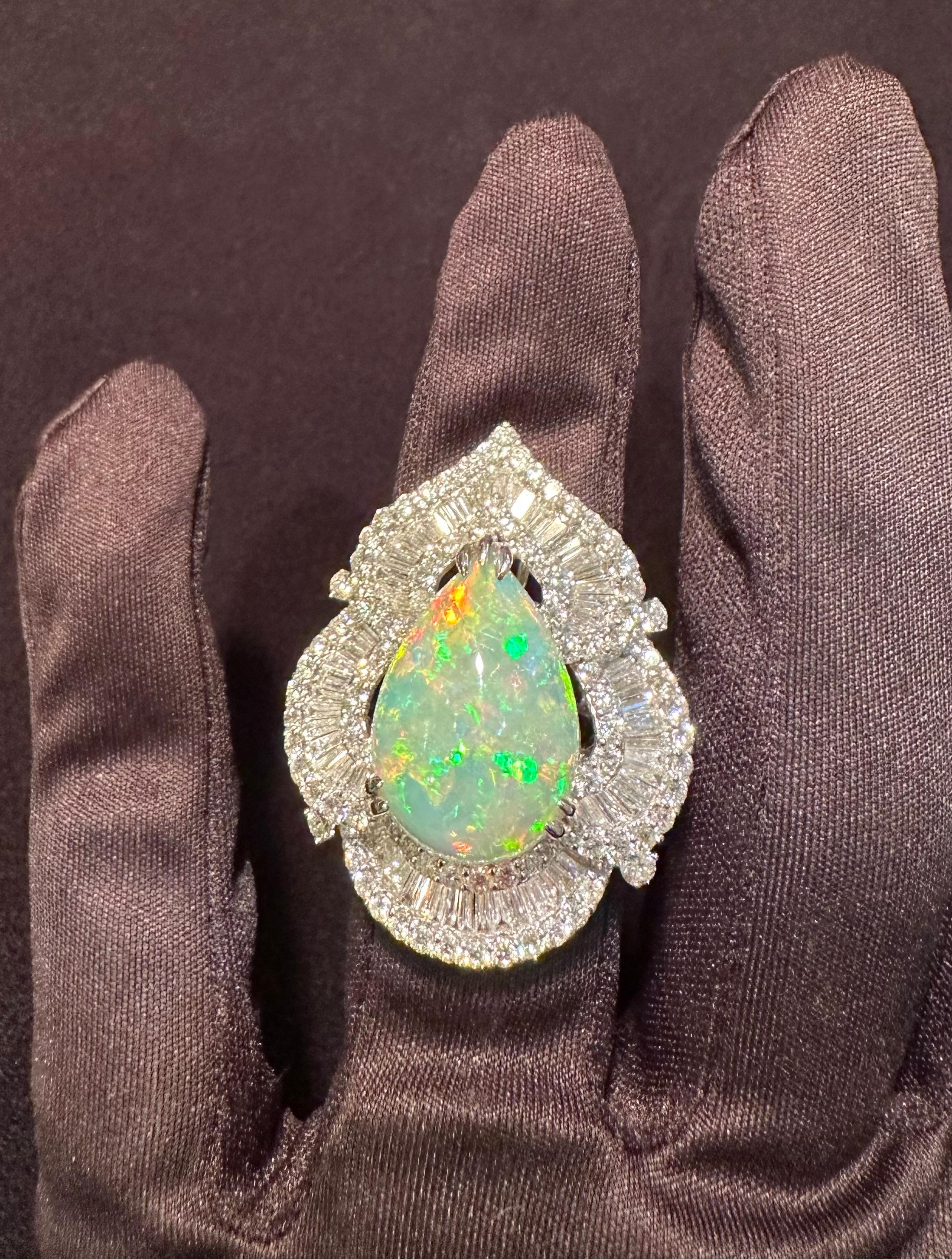Artisan Enchanting 24.70 Carat Opal and Diamond Scalloping Pear Shape 18K Cocktail Ring For Sale