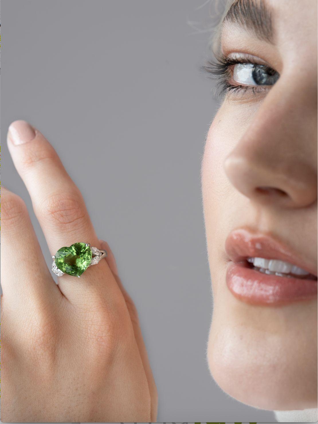 Contemporary Enchanting 7.62 Carat Burmese Peridot Heart Ring  For Sale