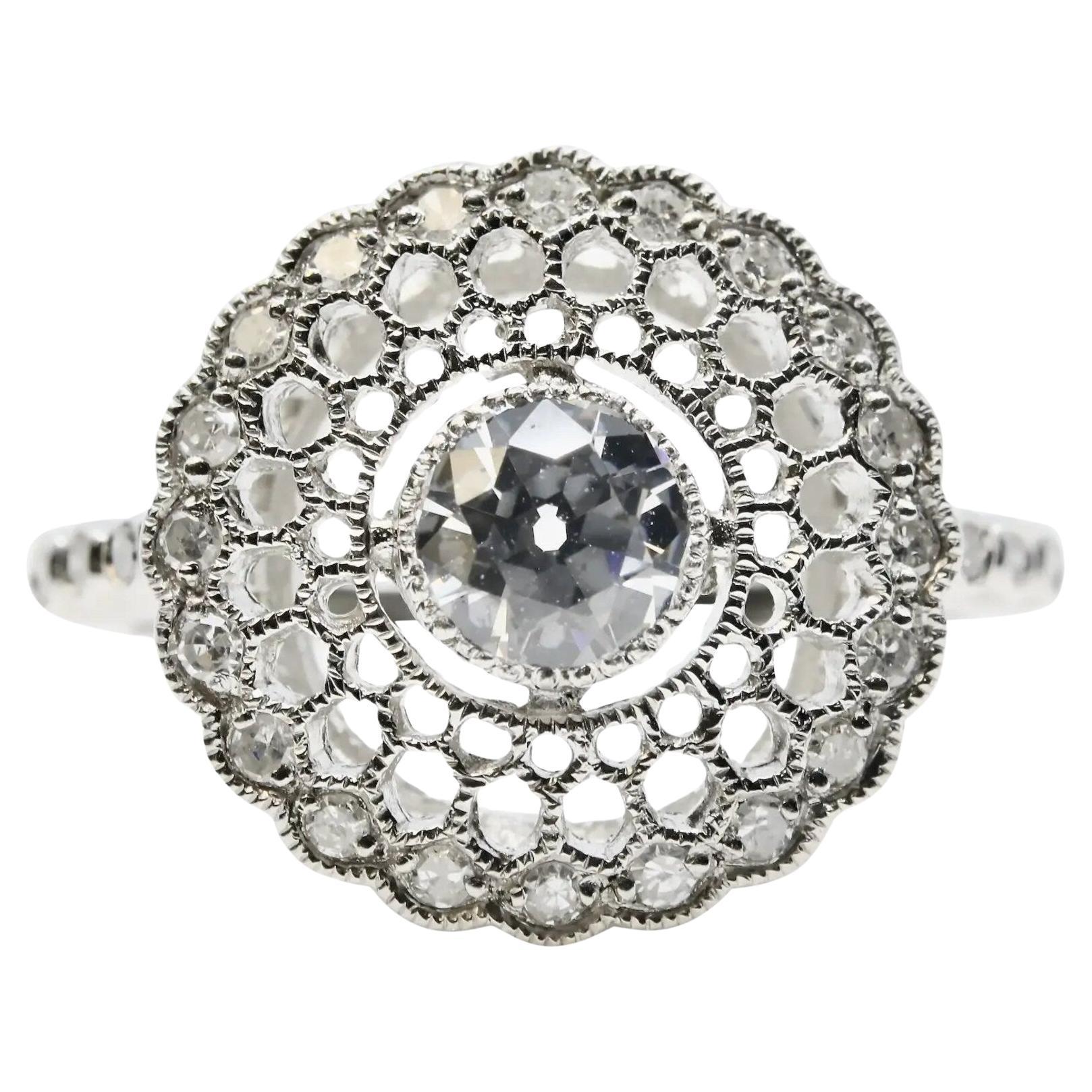 Enchanting Art Deco Diamond Filigree Engagement Ring in Platinum For Sale
