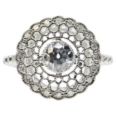 Incantevole anello di fidanzamento Art Deco con diamante a filigrana in platino
