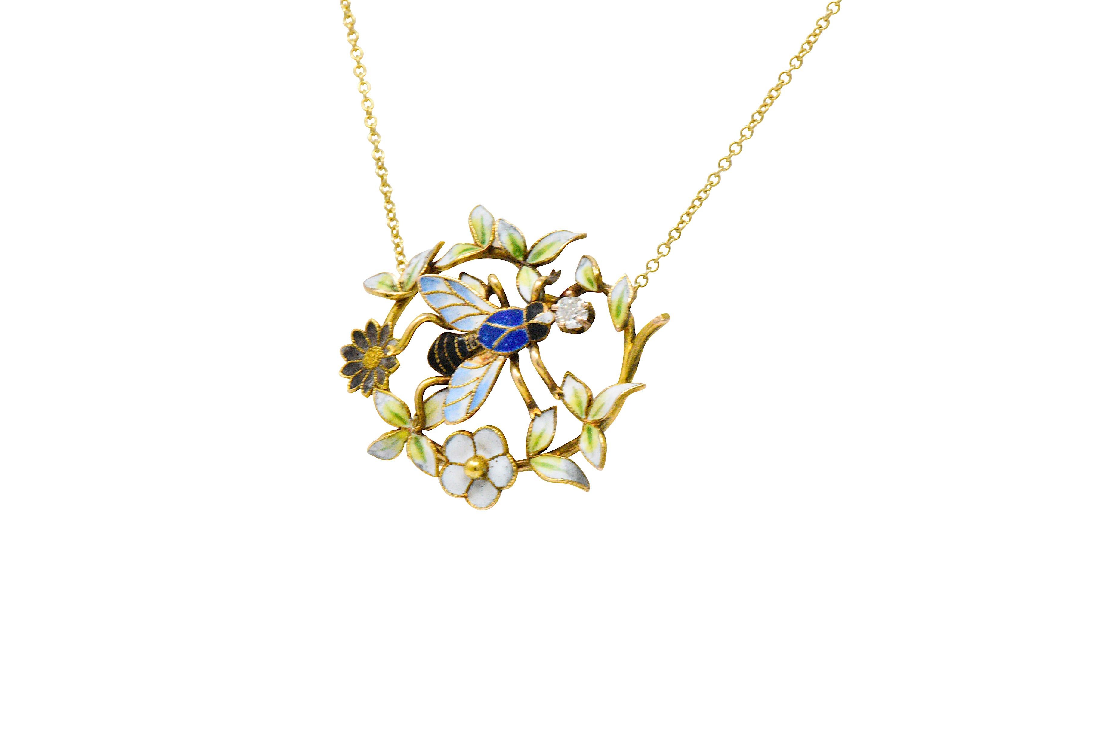 Centering an enamel bee with an old mine cut diamond weighing approximately 0.10 carat, eye-clean and white

Accented by bright colorful enamel flowers and leaves

Completed by a cable style chain, lobster clasp and Italian assay marks

Colorful and
