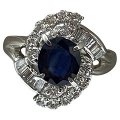 Enchanting Blue Sapphire and Natural Diamond Halo Platinum Ring