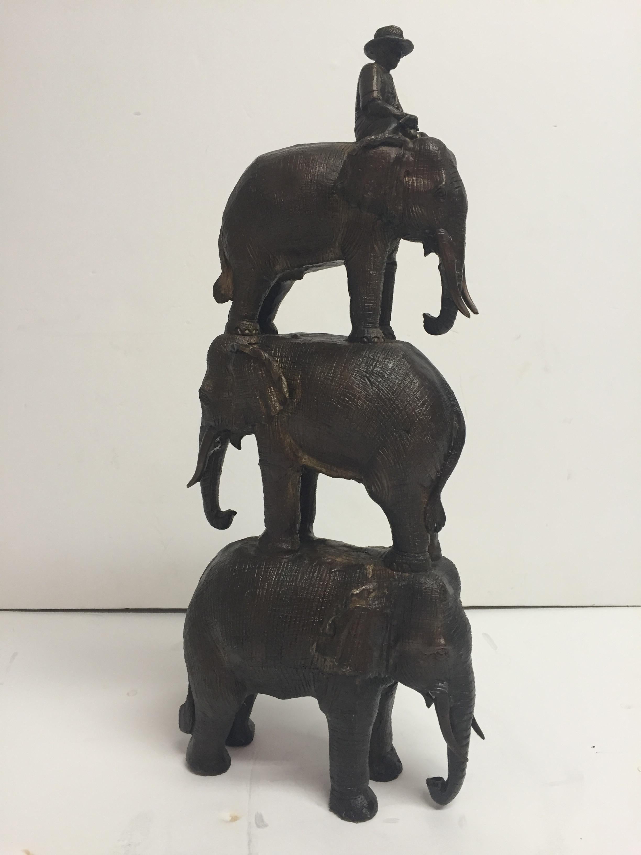 Enchanting Bronze Sculpture of a Man Riding Three Elephants For Sale 4