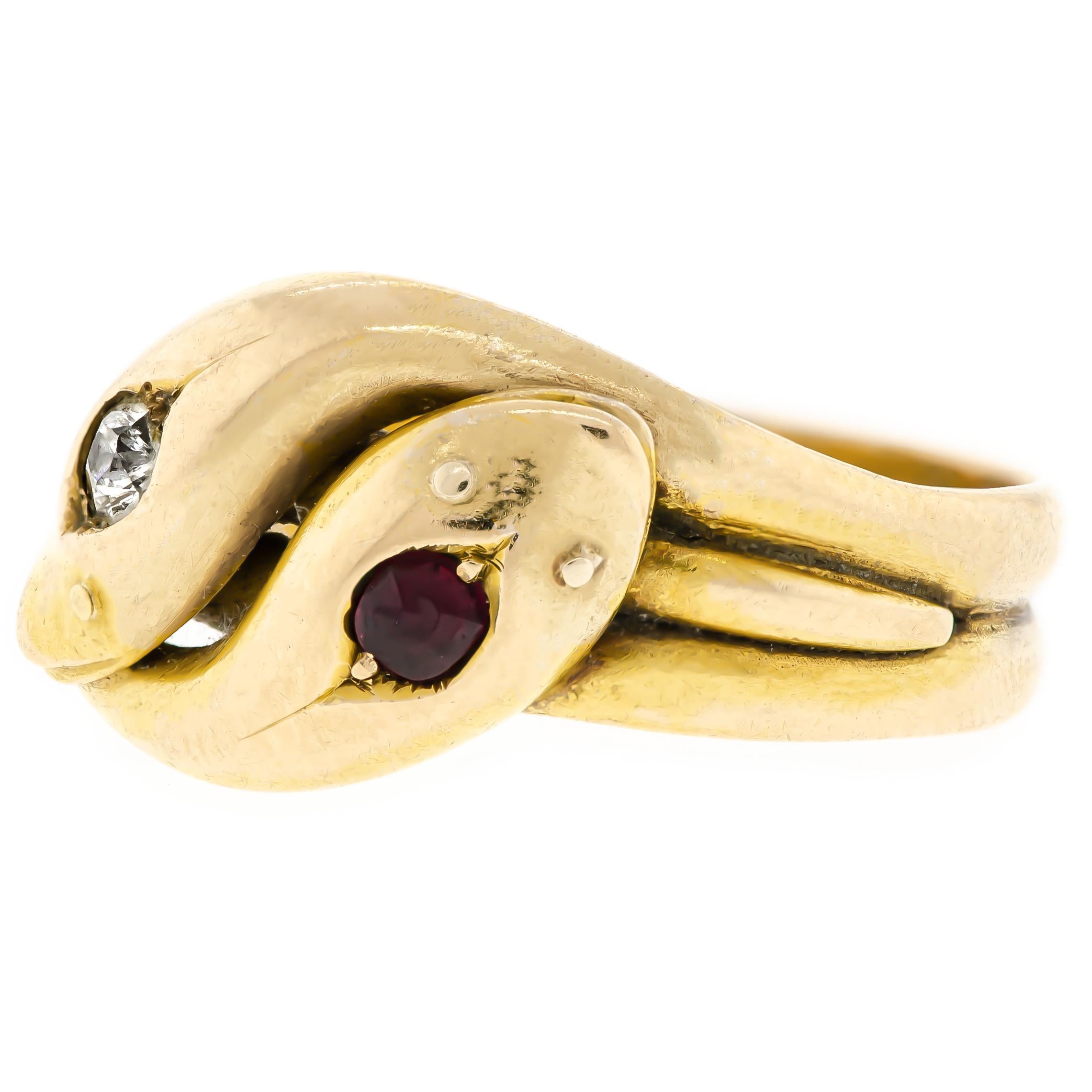 This fabulous diamond and ruby 15-carat double snake ring is a lovely Victorian find. During the Victorian era, two entwined serpents suggested love and were often given as a sign of affection. It was not uncommon to see this style of ring worn by