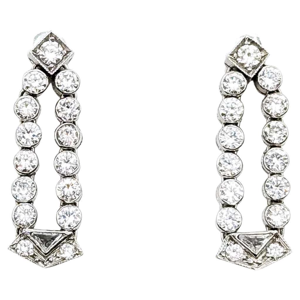 Boucles d'oreilles enchanteresses en diamant et platine