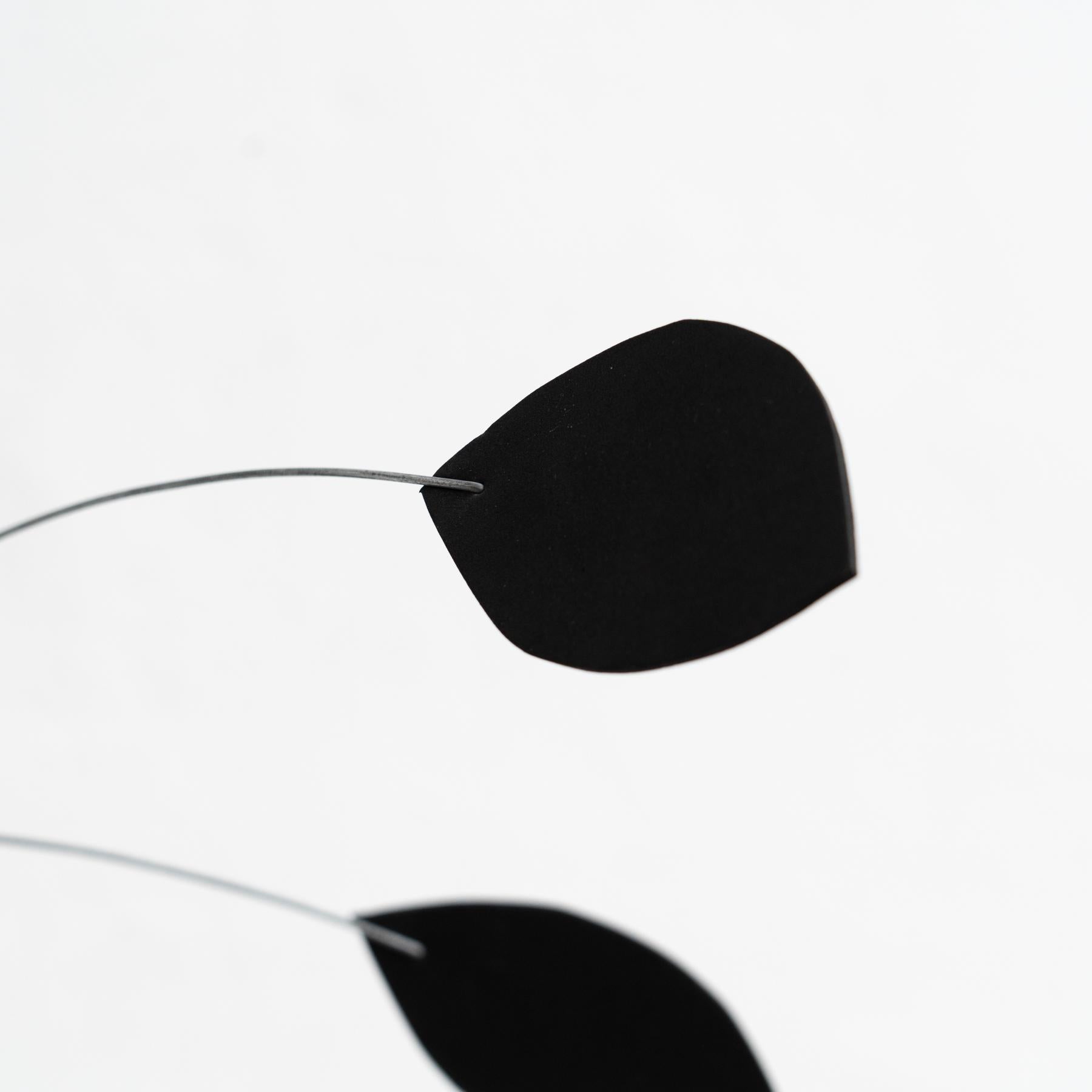 Enchanting Dynamics: Iron and Foam Kinetic Sculpture - Elegant Black in Play For Sale 3