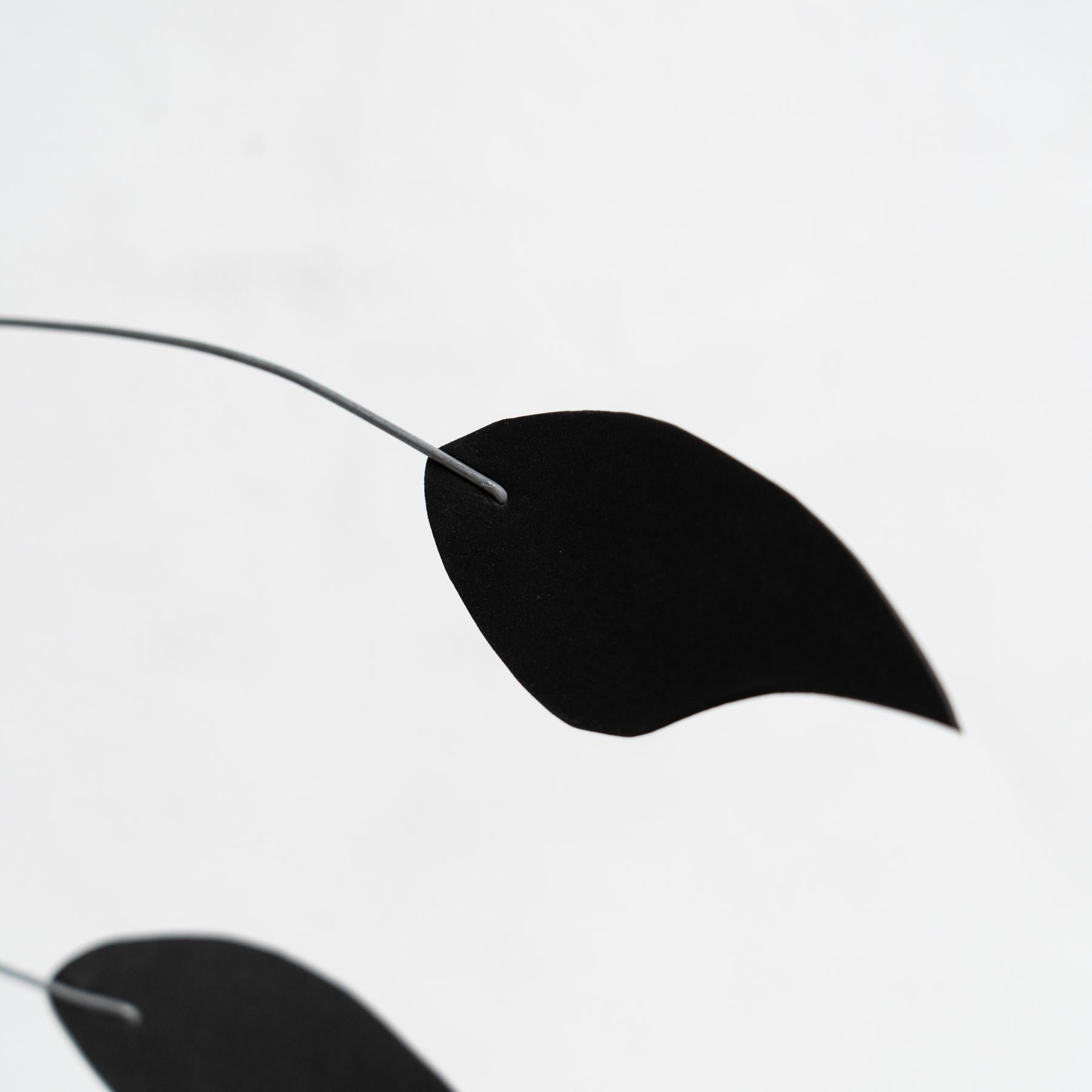 Enchanting Dynamics: Iron and Foam Kinetic Sculpture - Elegant Black in Play For Sale 4