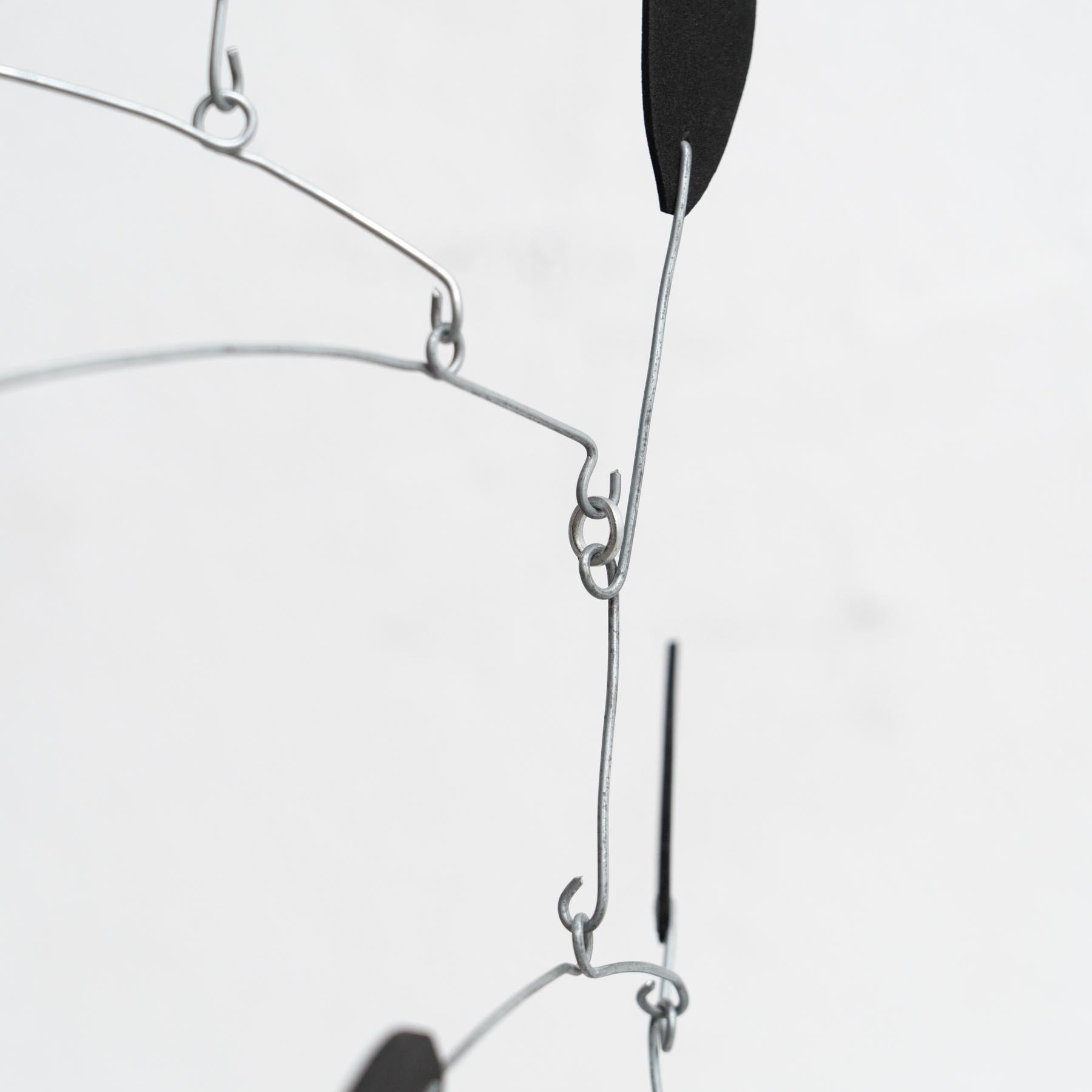 Enchanting Dynamics: Iron and Foam Kinetic Sculpture - Elegant Black in Play For Sale 6