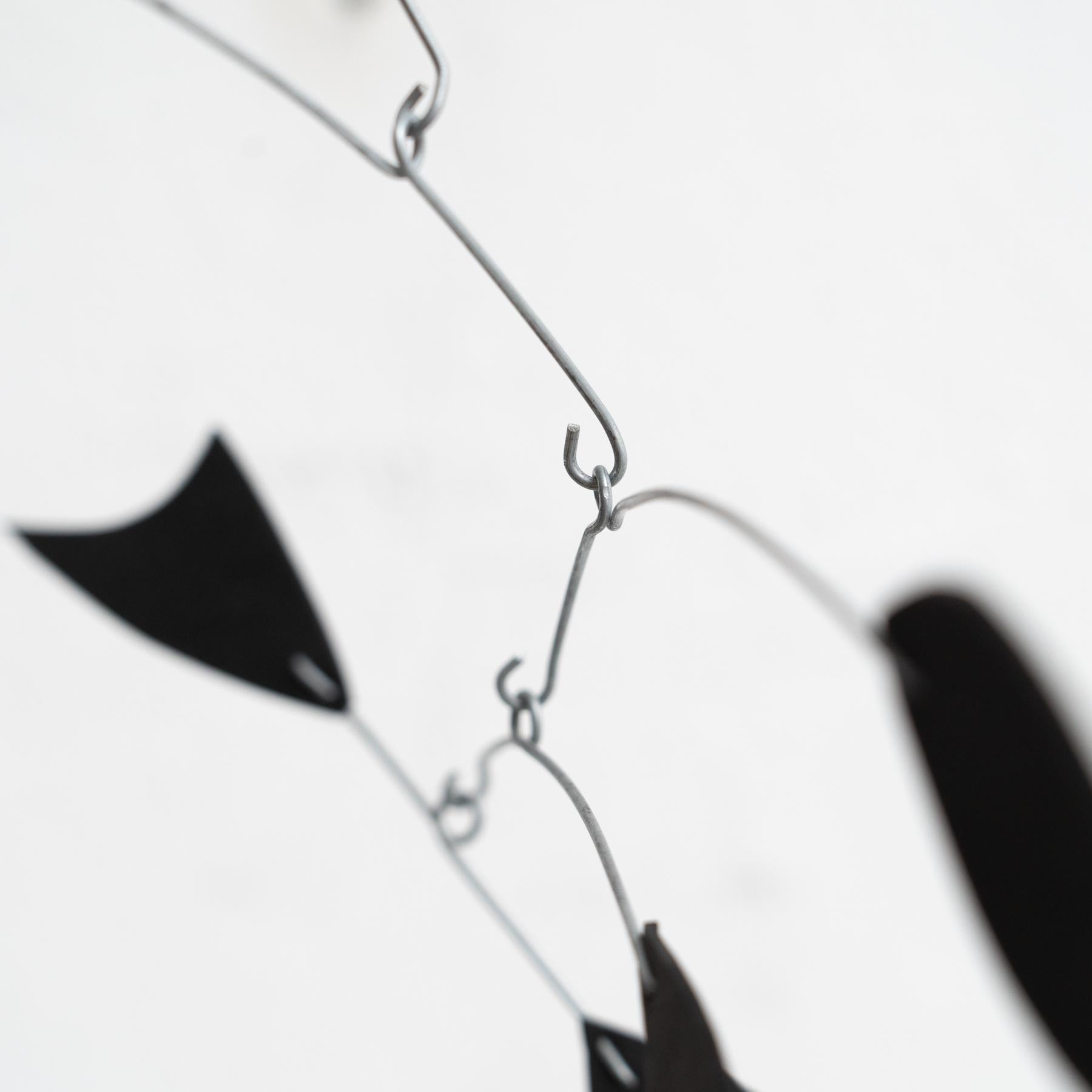 Enchanting Dynamics: Iron and Foam Kinetic Sculpture - Elegant Black in Play For Sale 6