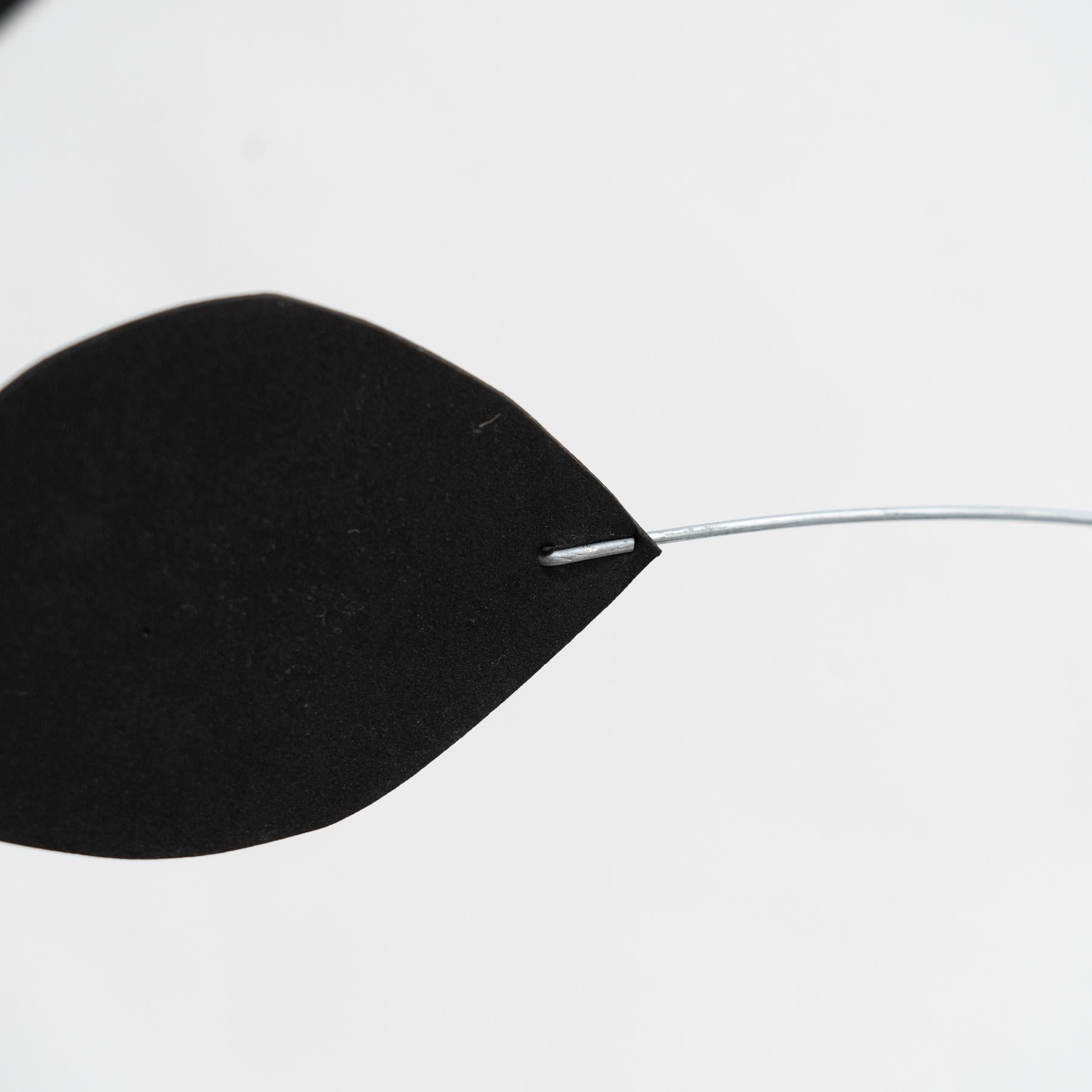 Enchanting Dynamics: Iron and Foam Kinetic Sculpture - Elegant Black in Play For Sale 7
