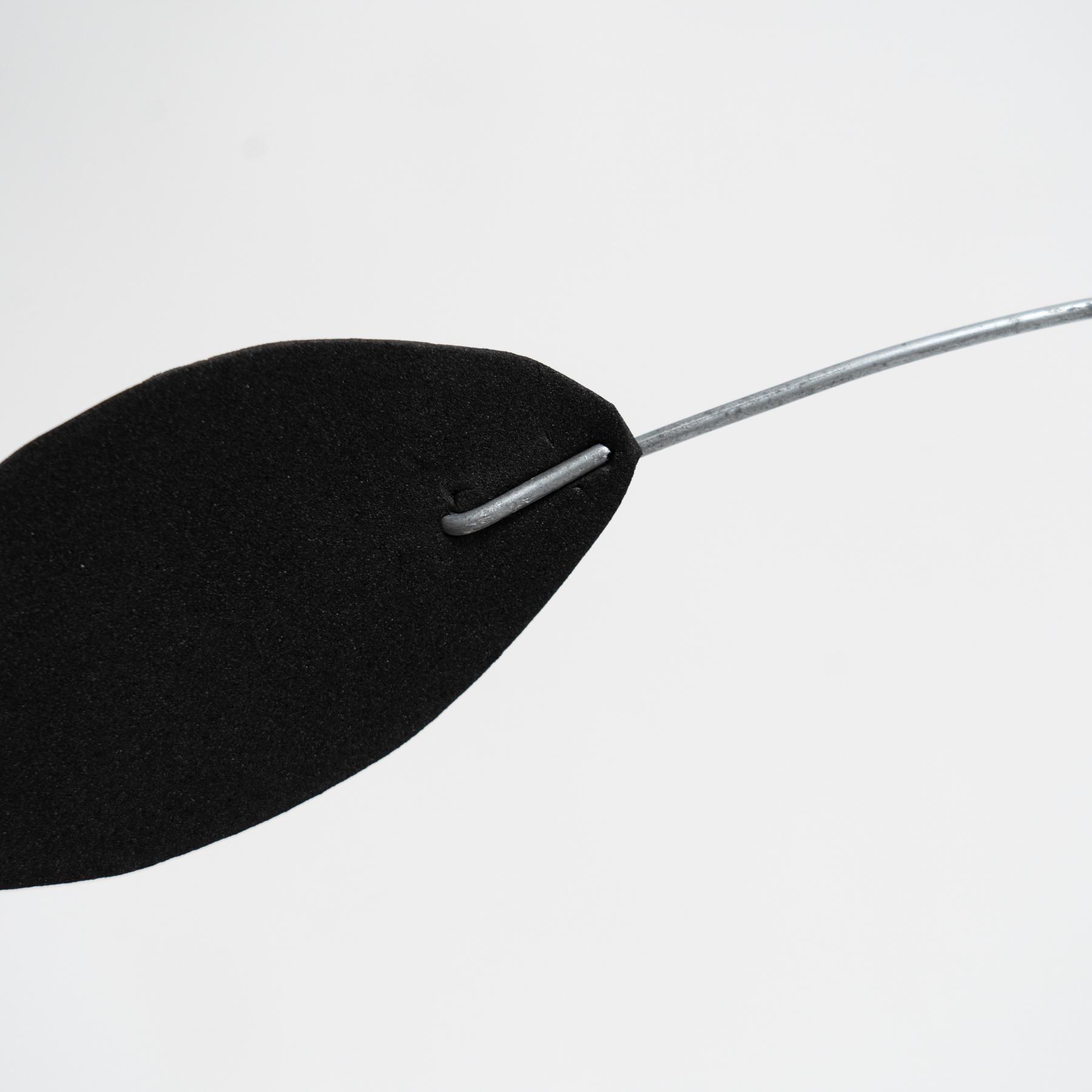 Enchanting Dynamics: Iron and Foam Kinetic Sculpture - Elegant Black in Play For Sale 8