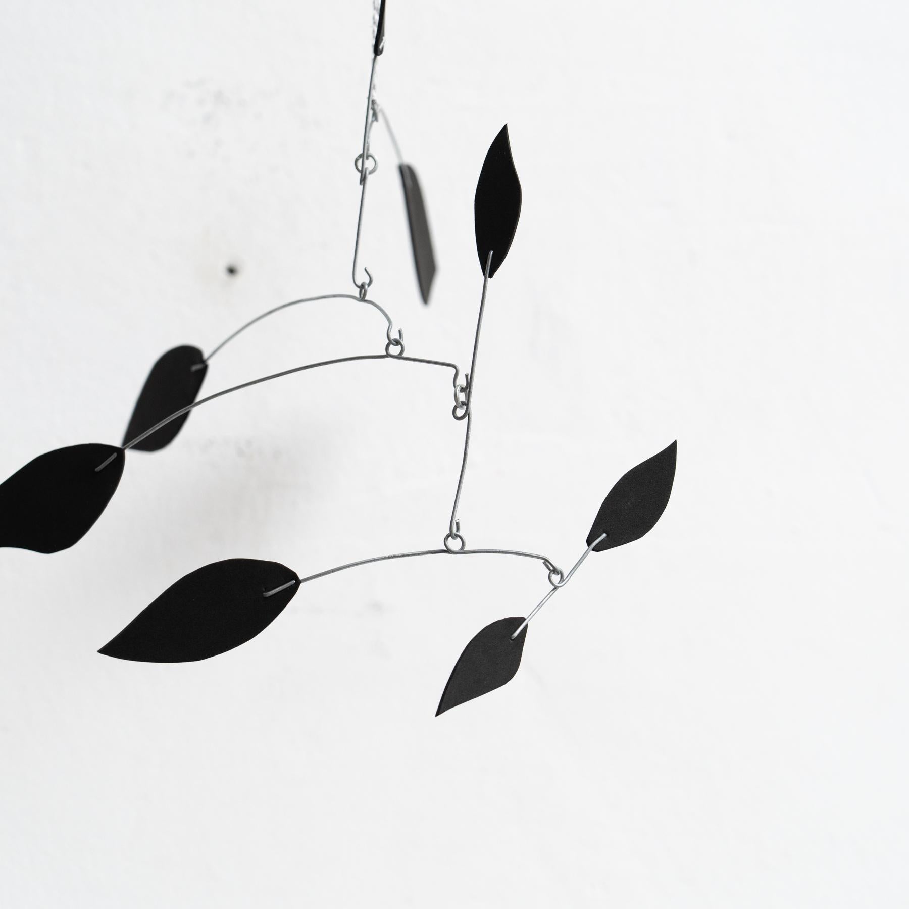 Enchanting Dynamics: Iron and Foam Kinetic Sculpture - Elegant Black in Play For Sale 1