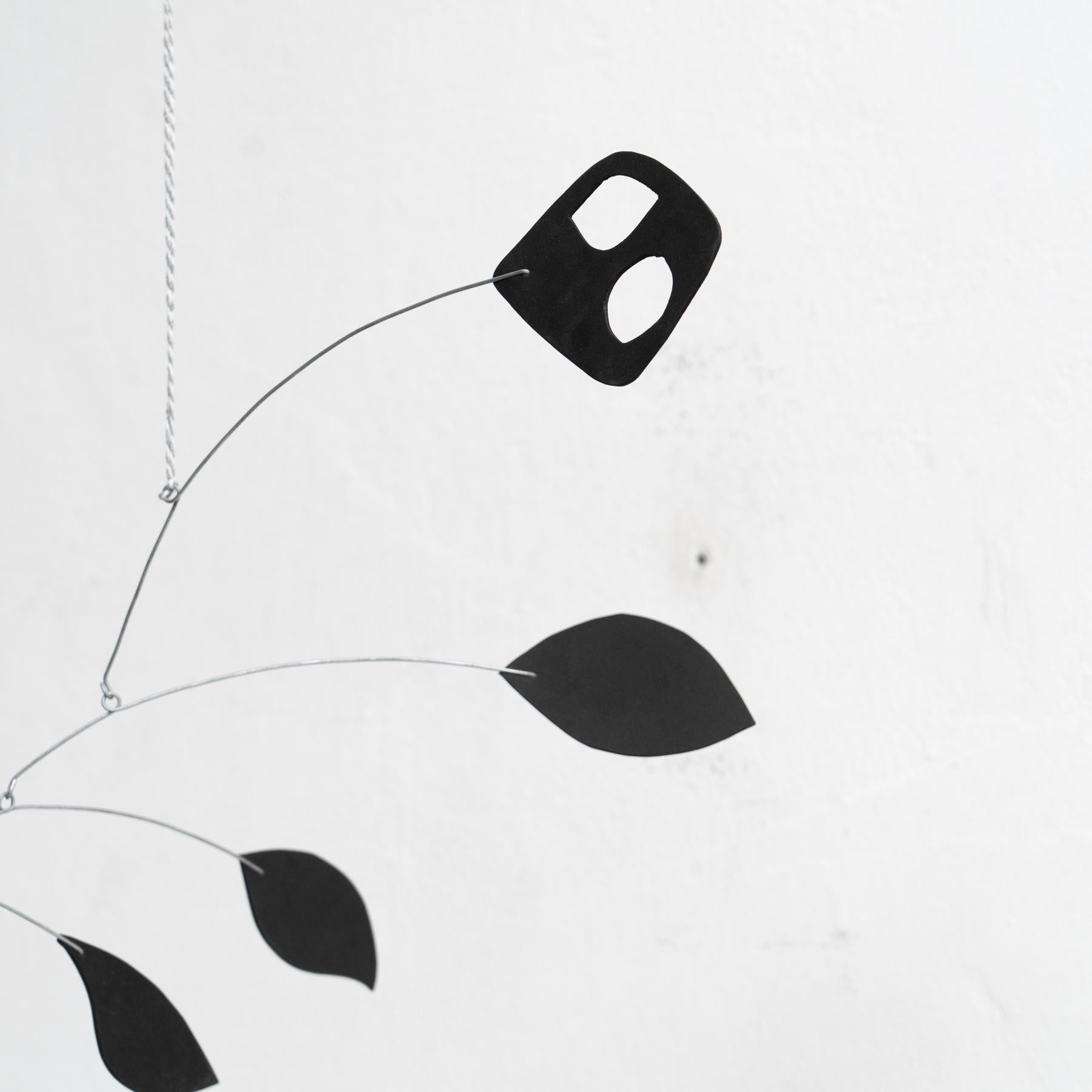 Enchanting Dynamics: Iron and Foam Kinetic Sculpture - Elegant Black in Play For Sale 1