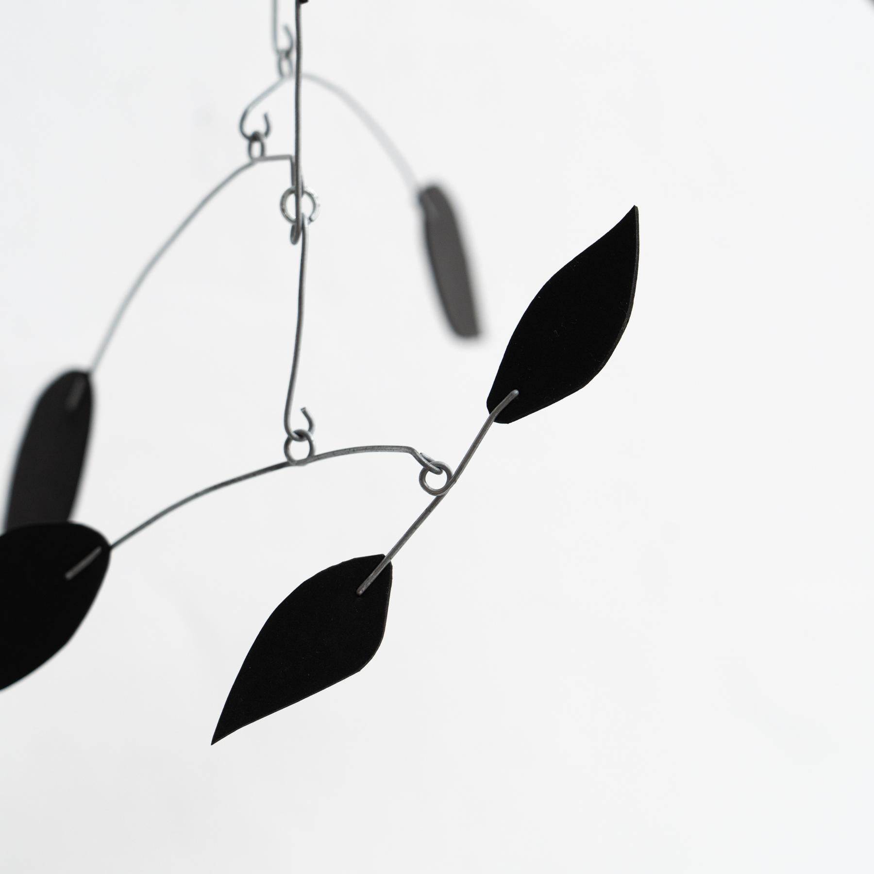Enchanting Dynamics: Iron and Foam Kinetic Sculpture - Elegant Black in Play For Sale 2